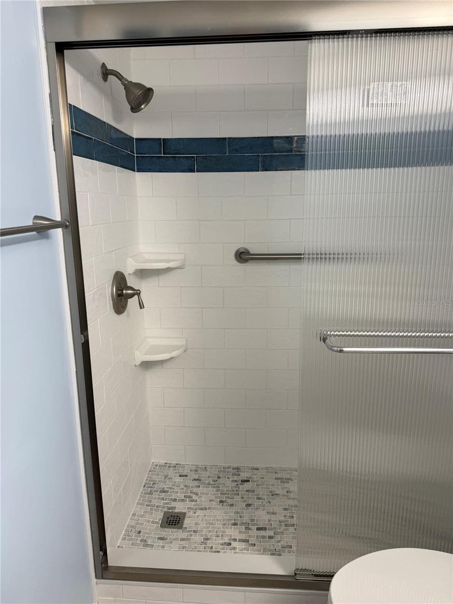 Walk in shower - 179 MEDALLION BLVD #D, MADEIRA BEACH