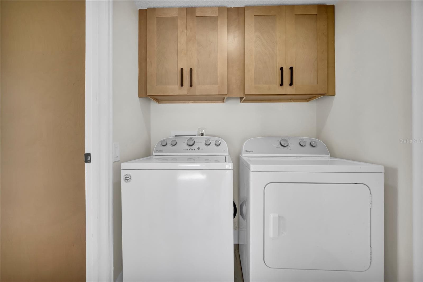 Attached laundry room with tons of storage. - 8320 SOUTHERN FOREST DR, ORLANDO