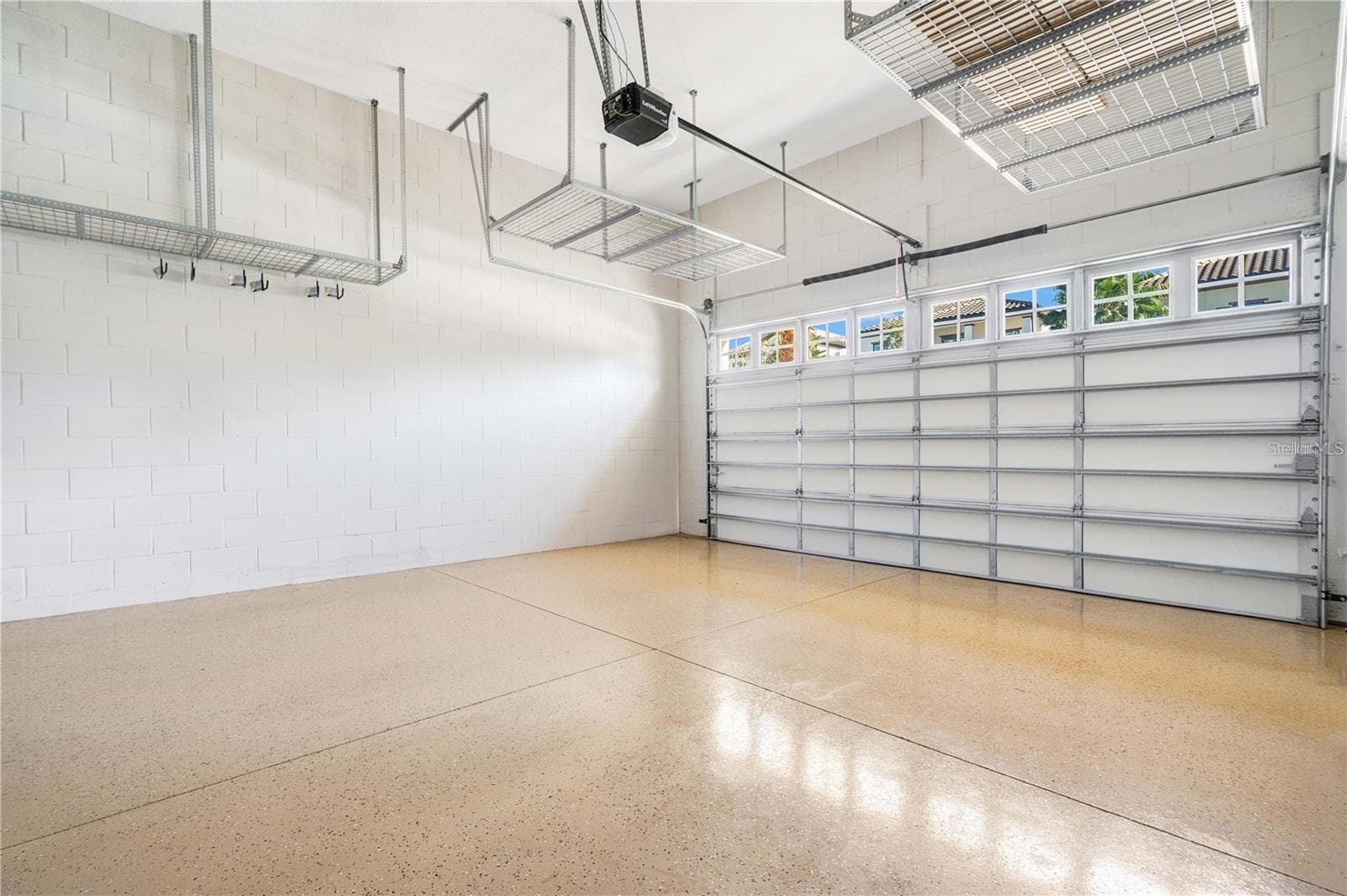 Garage has high ceilings & ample storage - 8449 VIA VITTORIA WAY, ORLANDO