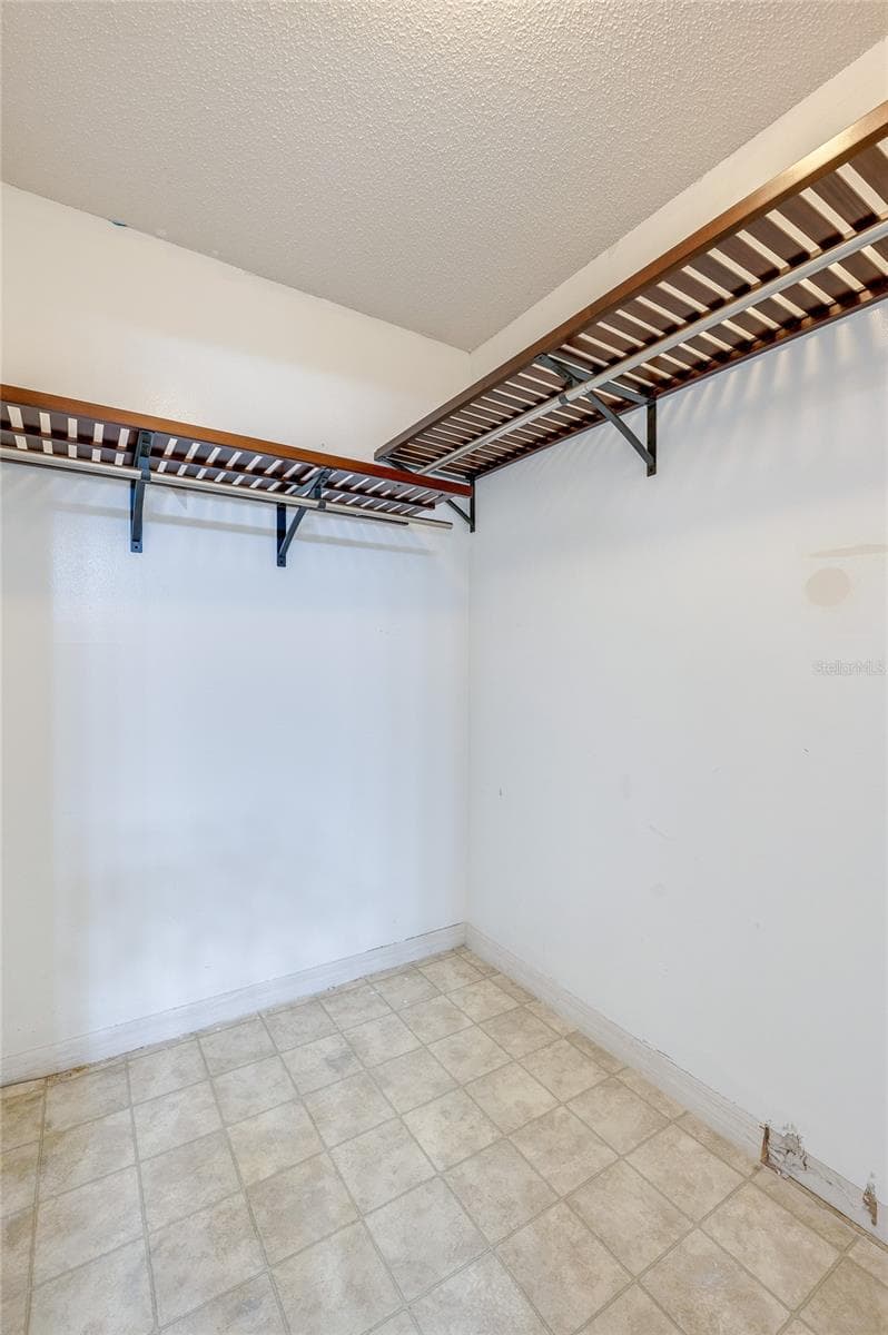 Walk-in closet - 1040 W VILLAGE GREEN RD, DELAND