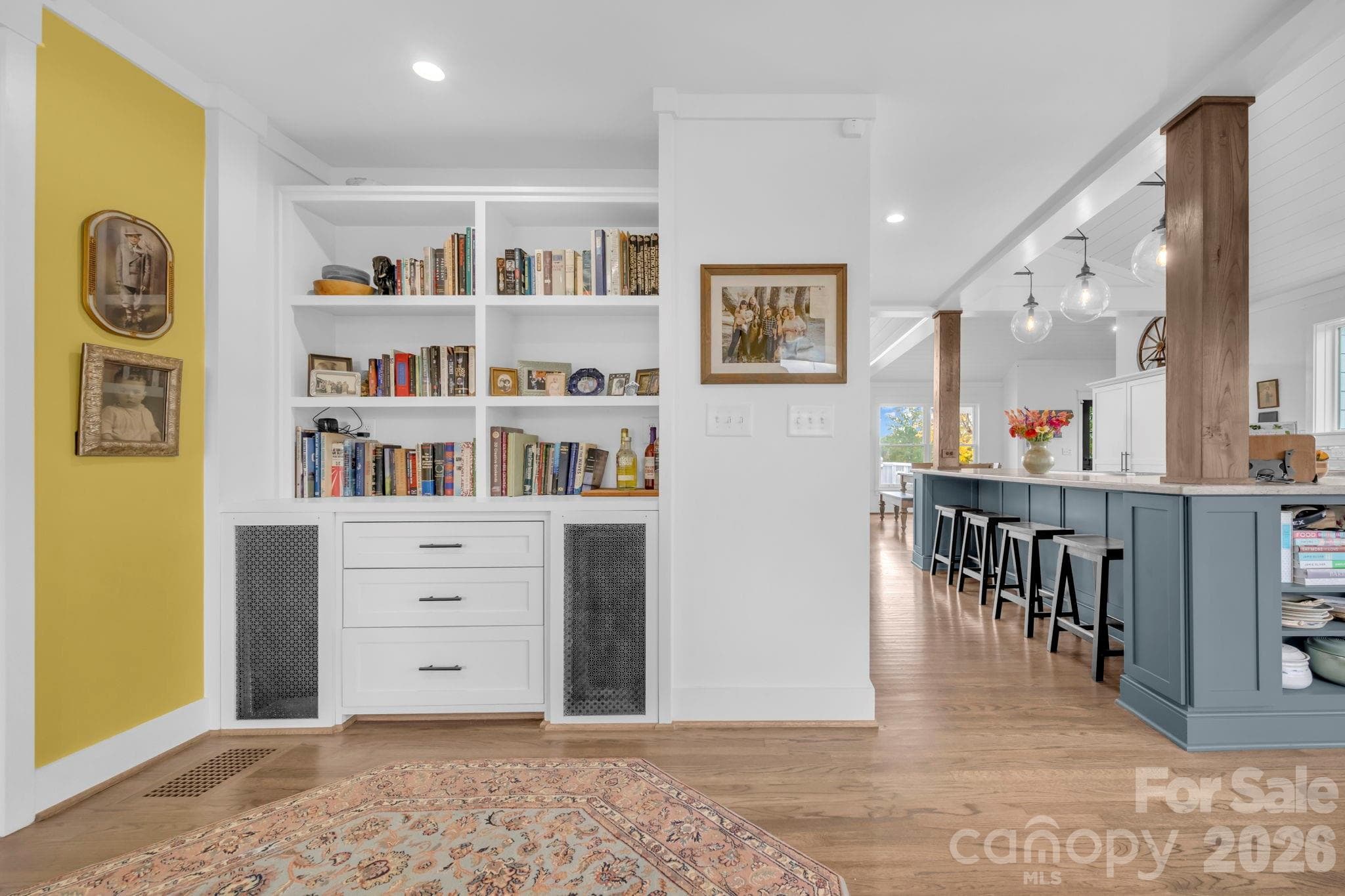 Sitting room adjacent to foyer w/ built in display shelves/bookcase and cabinet storage - 1260 Beaver Island Trail Road, Walnut Cove