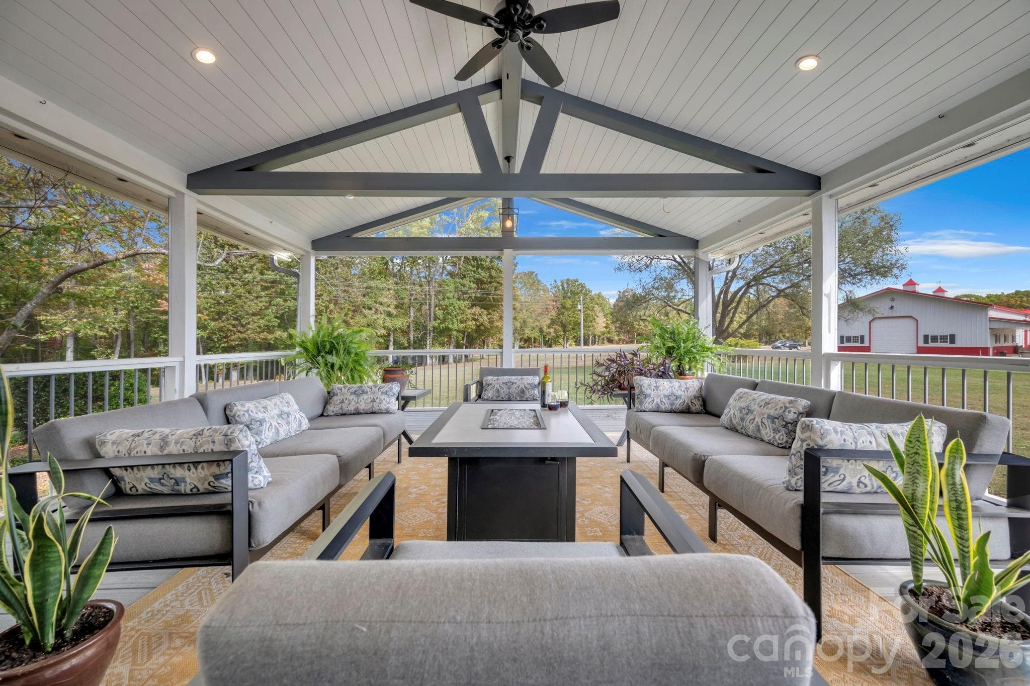 Large screen porch accessed from the deck and/or primary bedroom - 1260 Beaver Island Trail Road, Walnut Cove