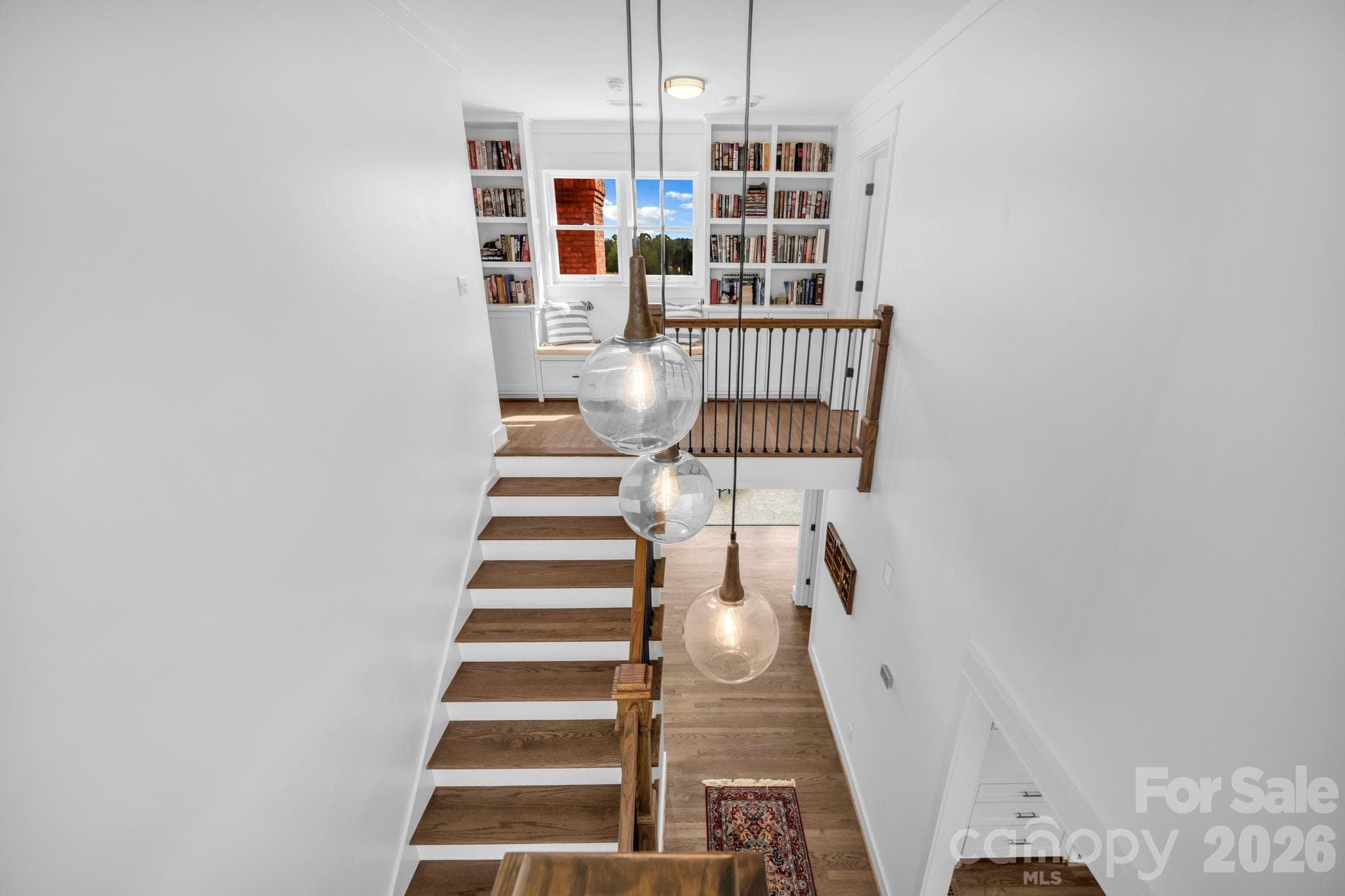 2 story foyer w/ hanging decorative ball light fixtures - 1260 Beaver Island Trail Road, Walnut Cove
