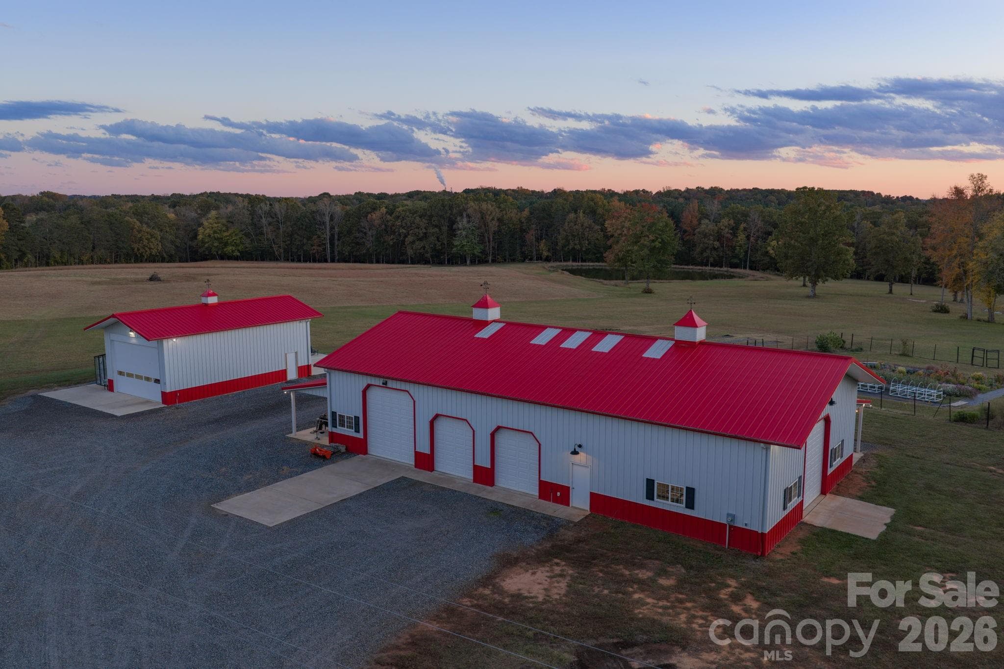 Equipment building w/ attached covered porches, built by Morton Buildings, 4 motorized garage doors, and ample space for equipment, storage, or hobby use - 1260 Beaver Island Trail Road, Walnut Cove