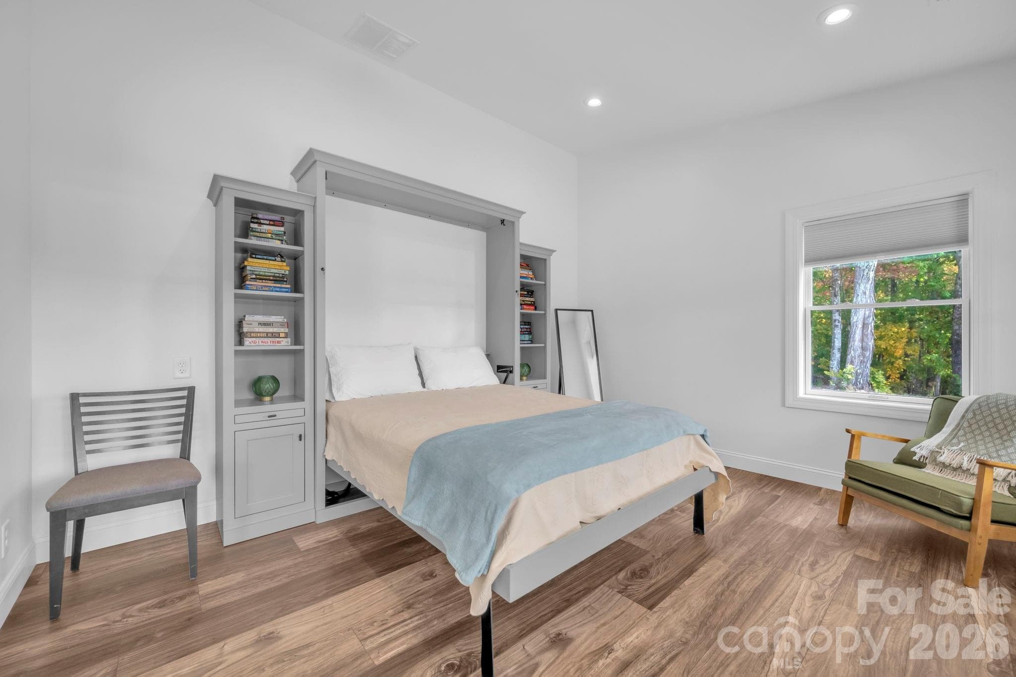 Guest bedroom w/ Murphy bed w/ built in cabinet and display shelves - 1260 Beaver Island Trail Road, Walnut Cove