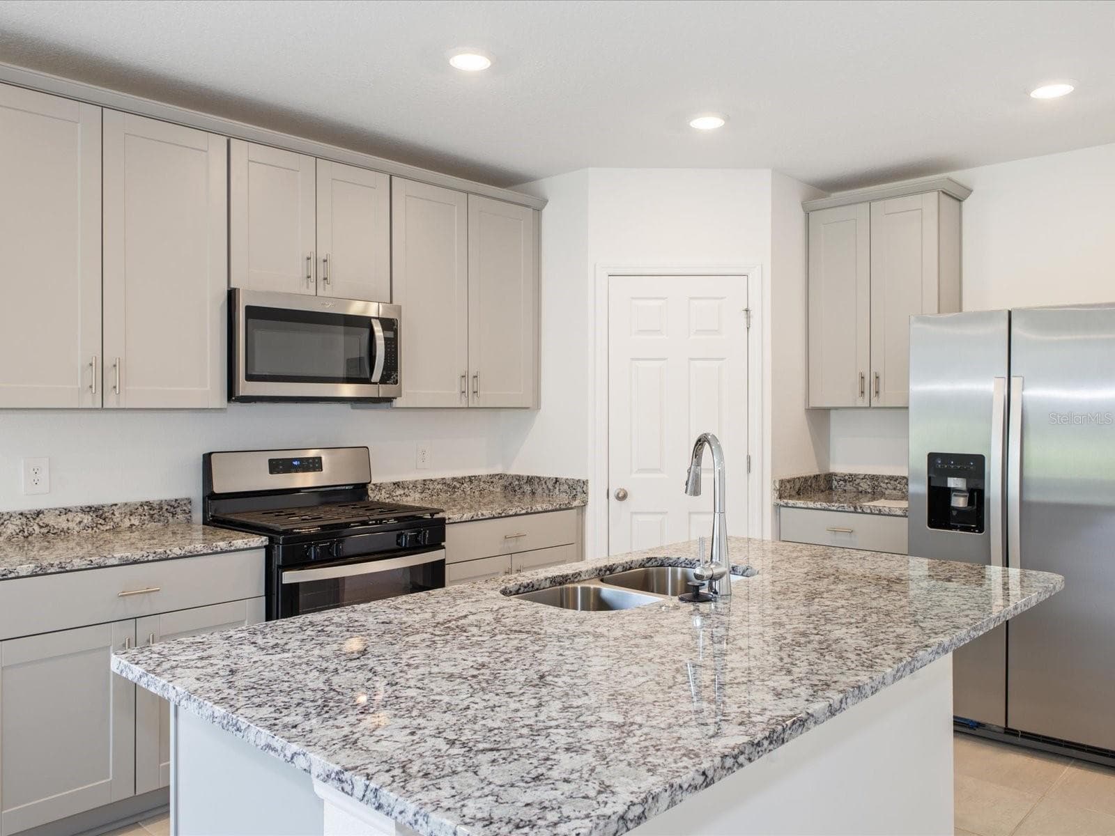 Photo is not of the actual home, but is an inspirational photo of builder’s model home and may depict options, furnishings, and/or decorator features that are not included. - 4542 EAGLE PERCH CT, ST CLOUD