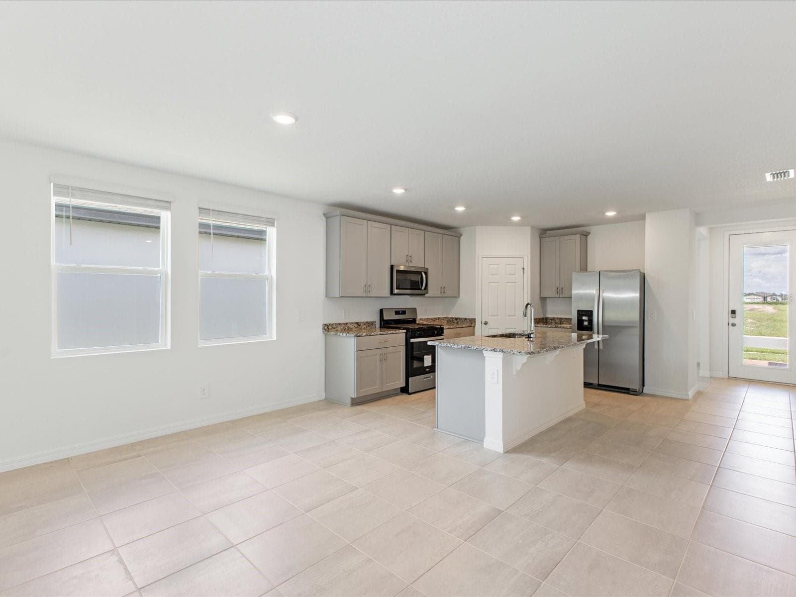 Photo is not of the actual home, but is an inspirational photo of builder’s model home and may depict options, furnishings, and/or decorator features that are not included. - 4542 EAGLE PERCH CT, ST CLOUD