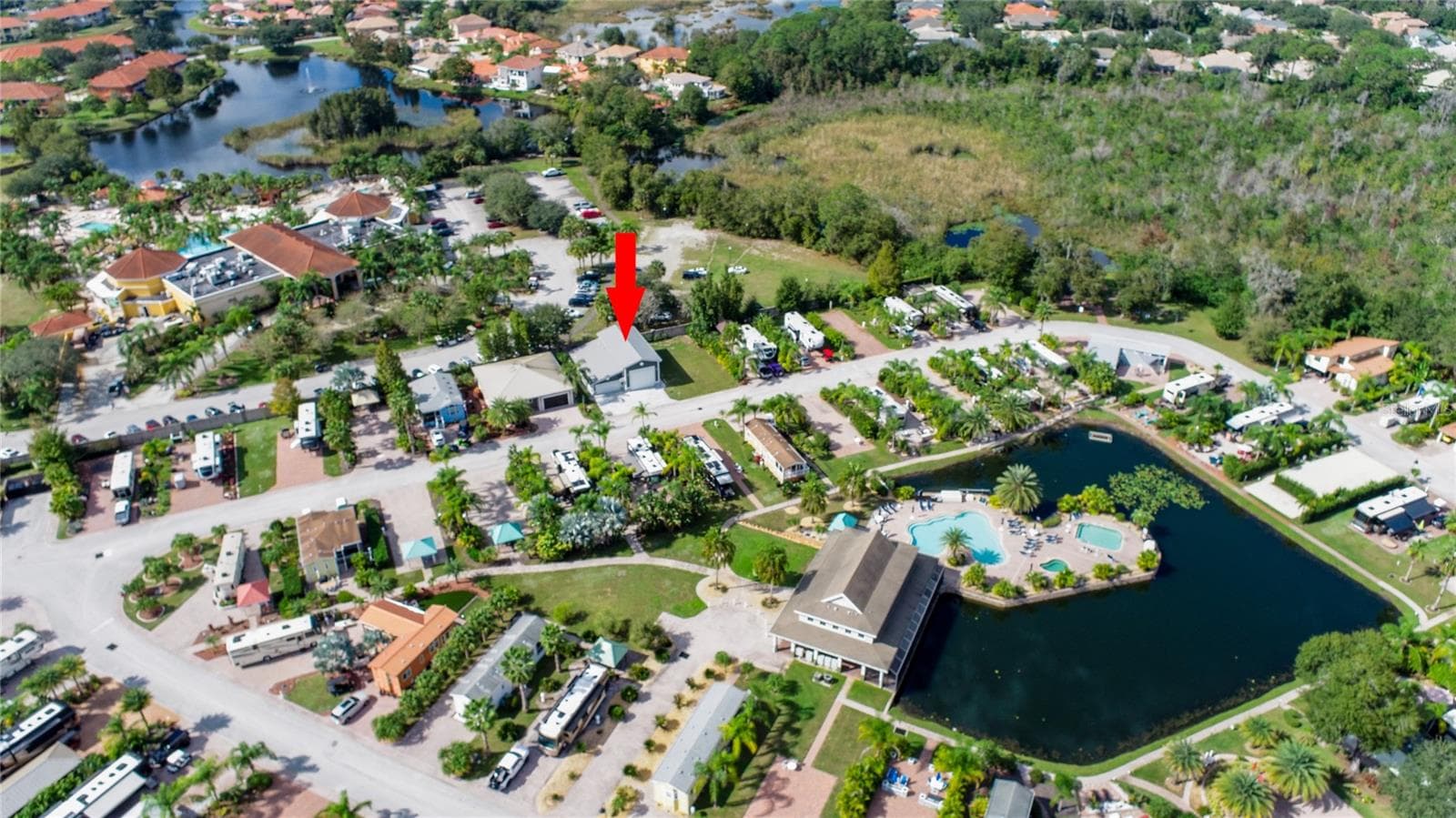 Aerial view of the Woods with Caliente in the back left. - 6757 AMANDA VISTA CIR, LAND O LAKES