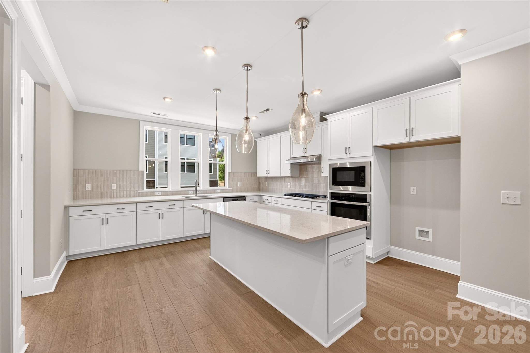 Gourmet Kitchen with white cabinets - 6008 Yellow Buckeye Drive, Charlotte