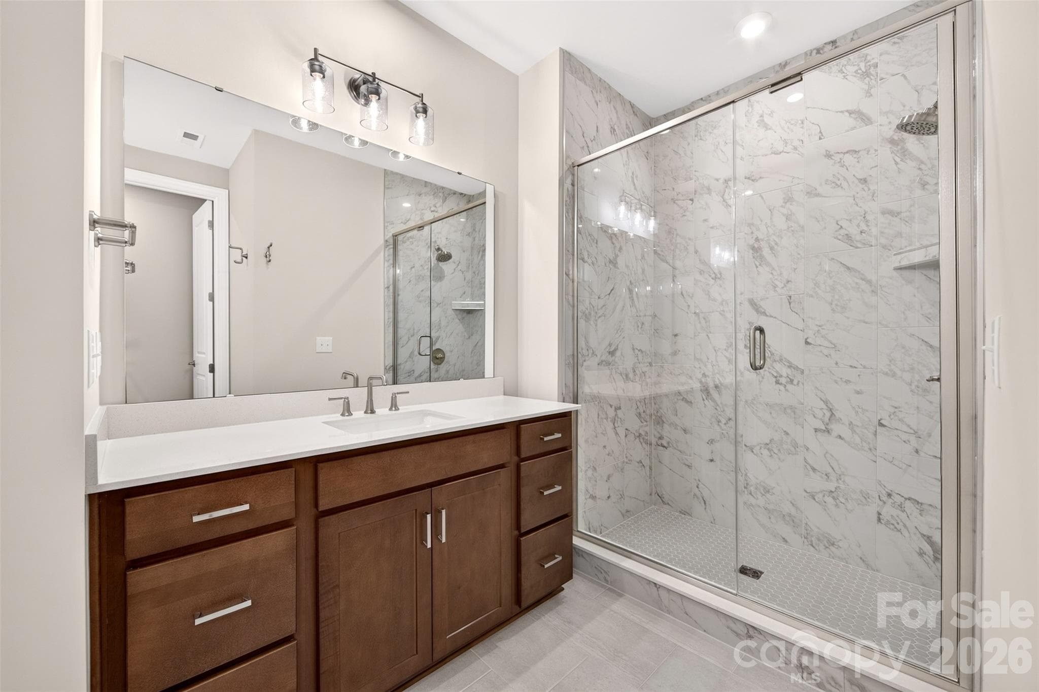 Primary bathroom with walk-in shower - 6008 Yellow Buckeye Drive, Charlotte