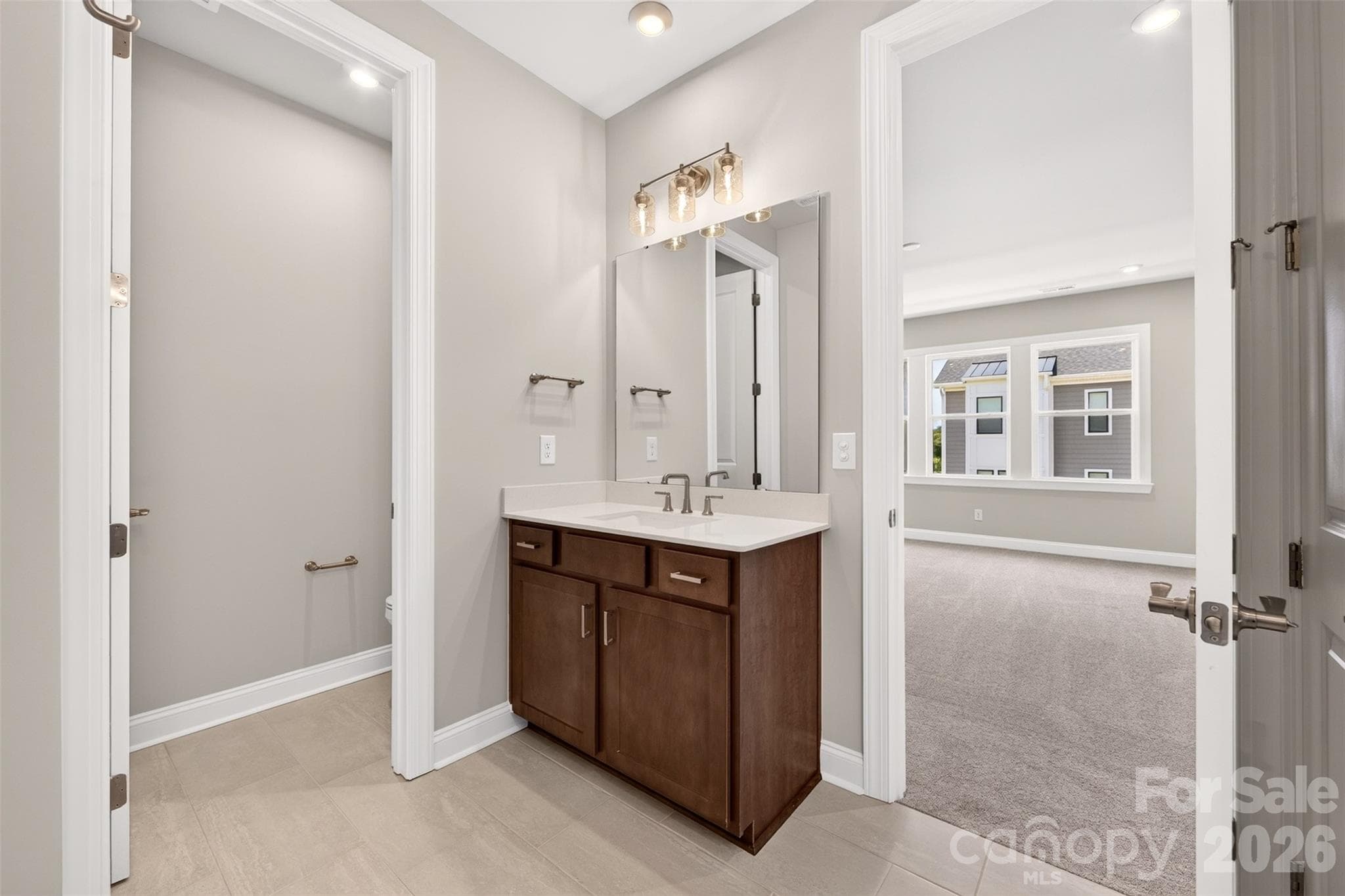 Dual vanity primary bathroom - 6008 Yellow Buckeye Drive, Charlotte