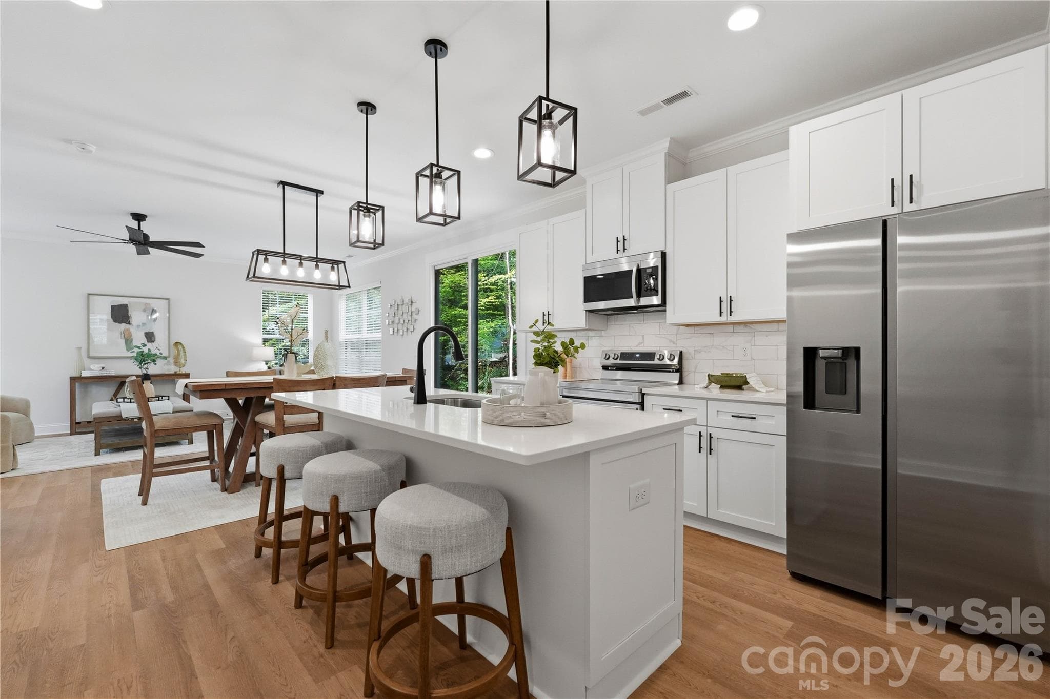 Kitchen open to dining and living room areas - 14133 Woodhurst Lane, Mint Hill