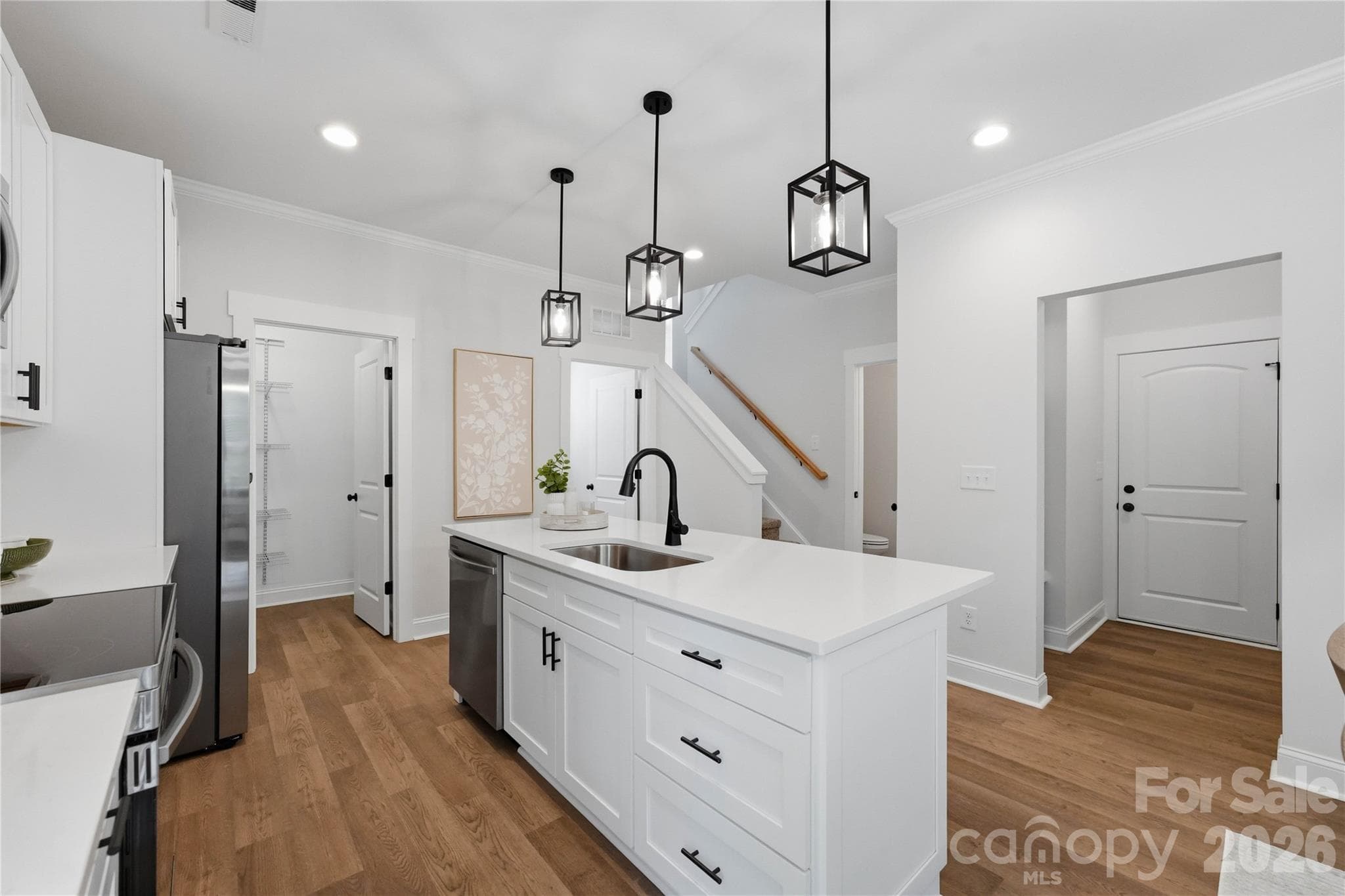 Drop zone, half bath, large walk-in pantry and laundry room off kitchen - 14133 Woodhurst Lane, Mint Hill