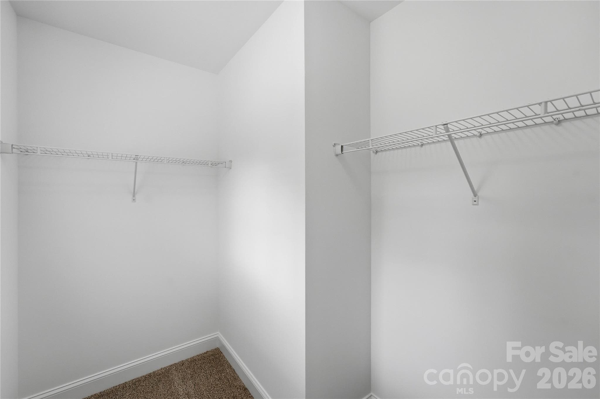 Walk-in closet in secondary bedroom 2 - 14133 Woodhurst Lane, Mint Hill