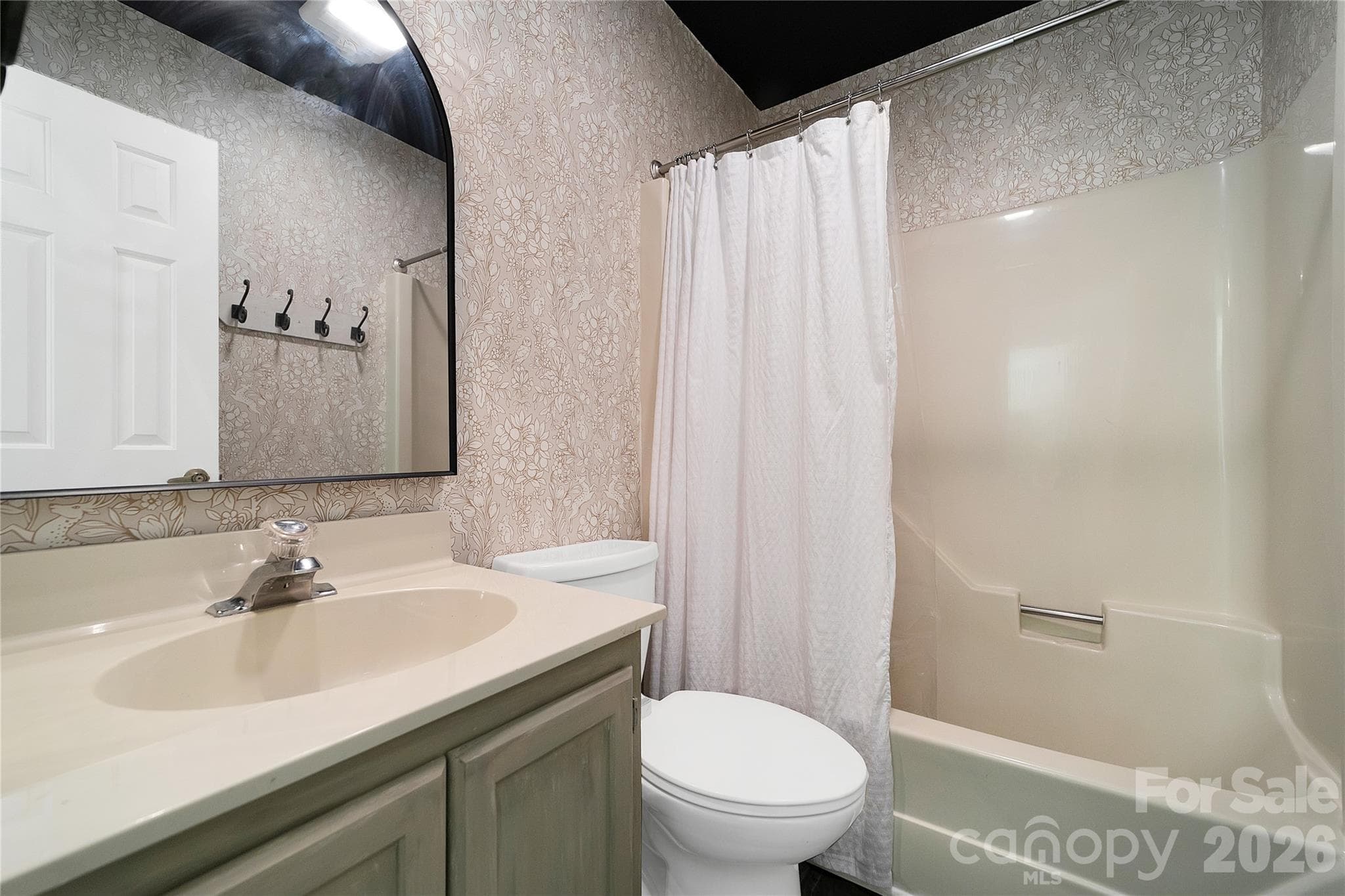 2nd full bathroom is across from the laundry closet. - 110 Lakeview Court, Brevard
