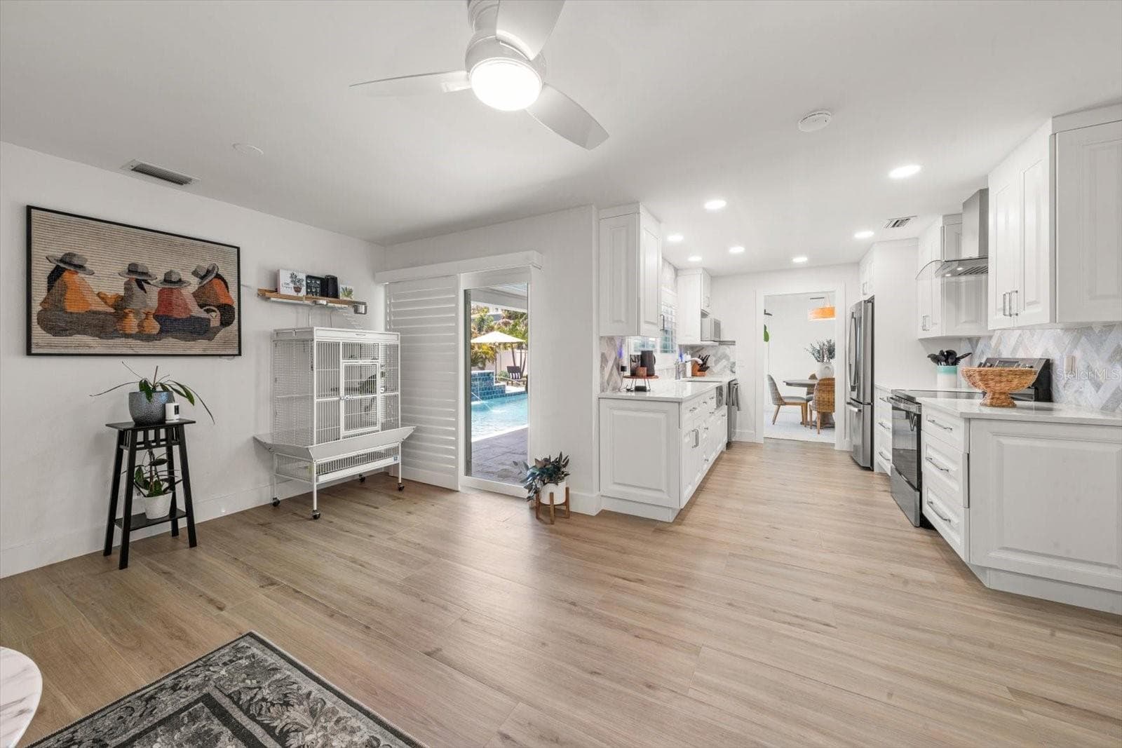 Great space off the kitchen with sliding glass doors to the Pool and Patio! - 821 JACARANDA DR, LARGO