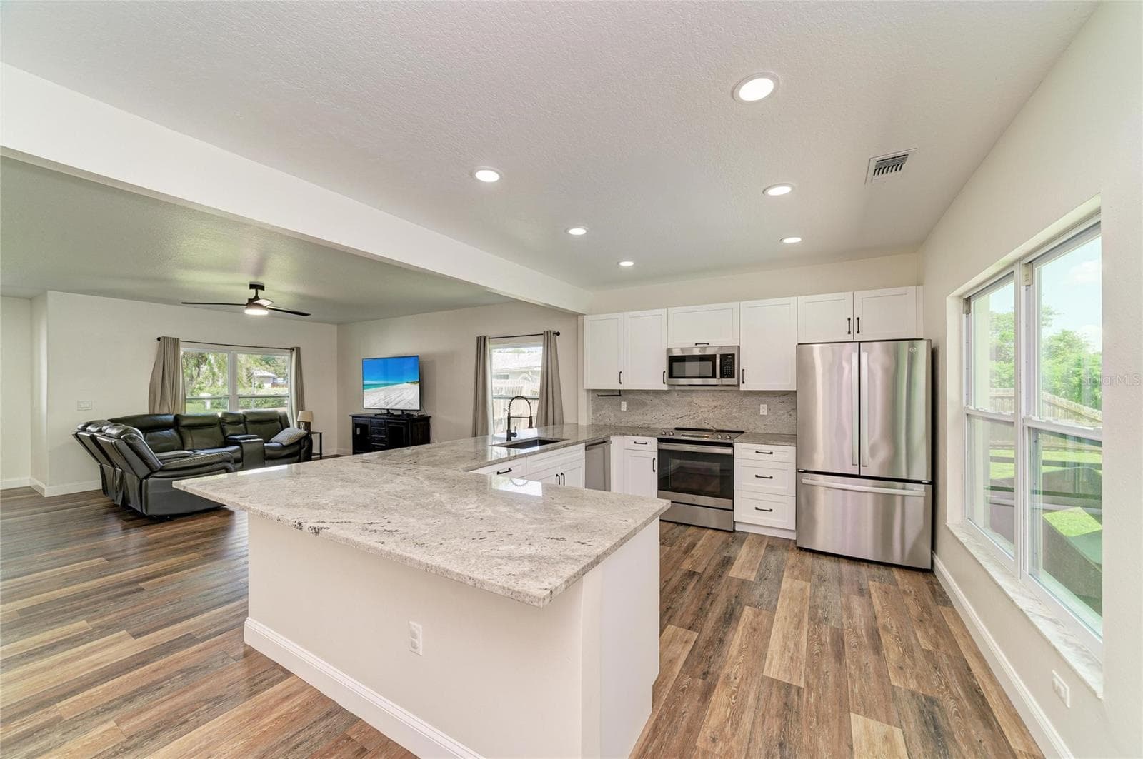 Newly remodeled kitchen that looks out to living room - 3220 37TH TER E, BRADENTON