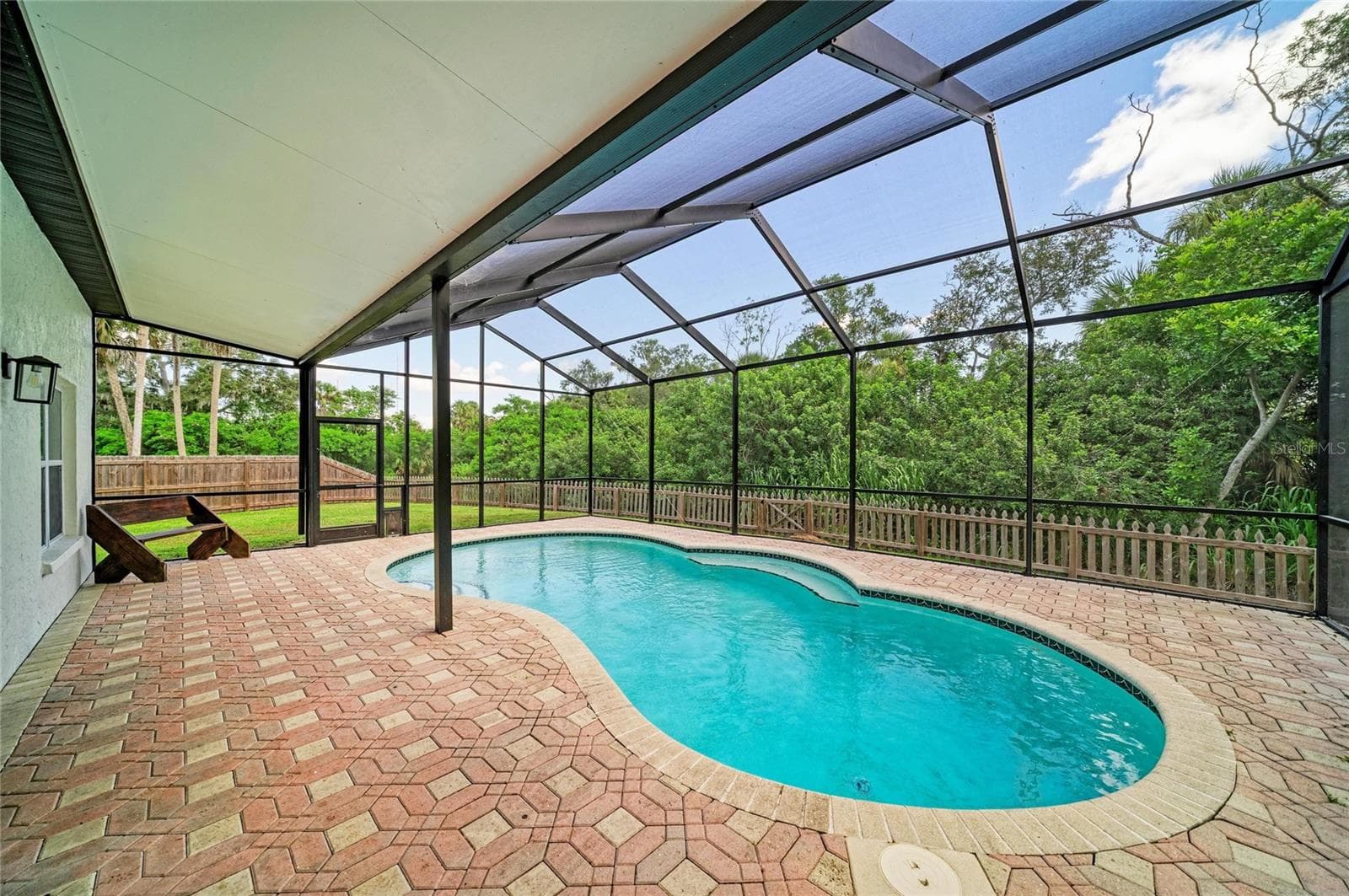 Heated and chilled salt-water pool with newly screened enclosure. - 3220 37TH TER E, BRADENTON