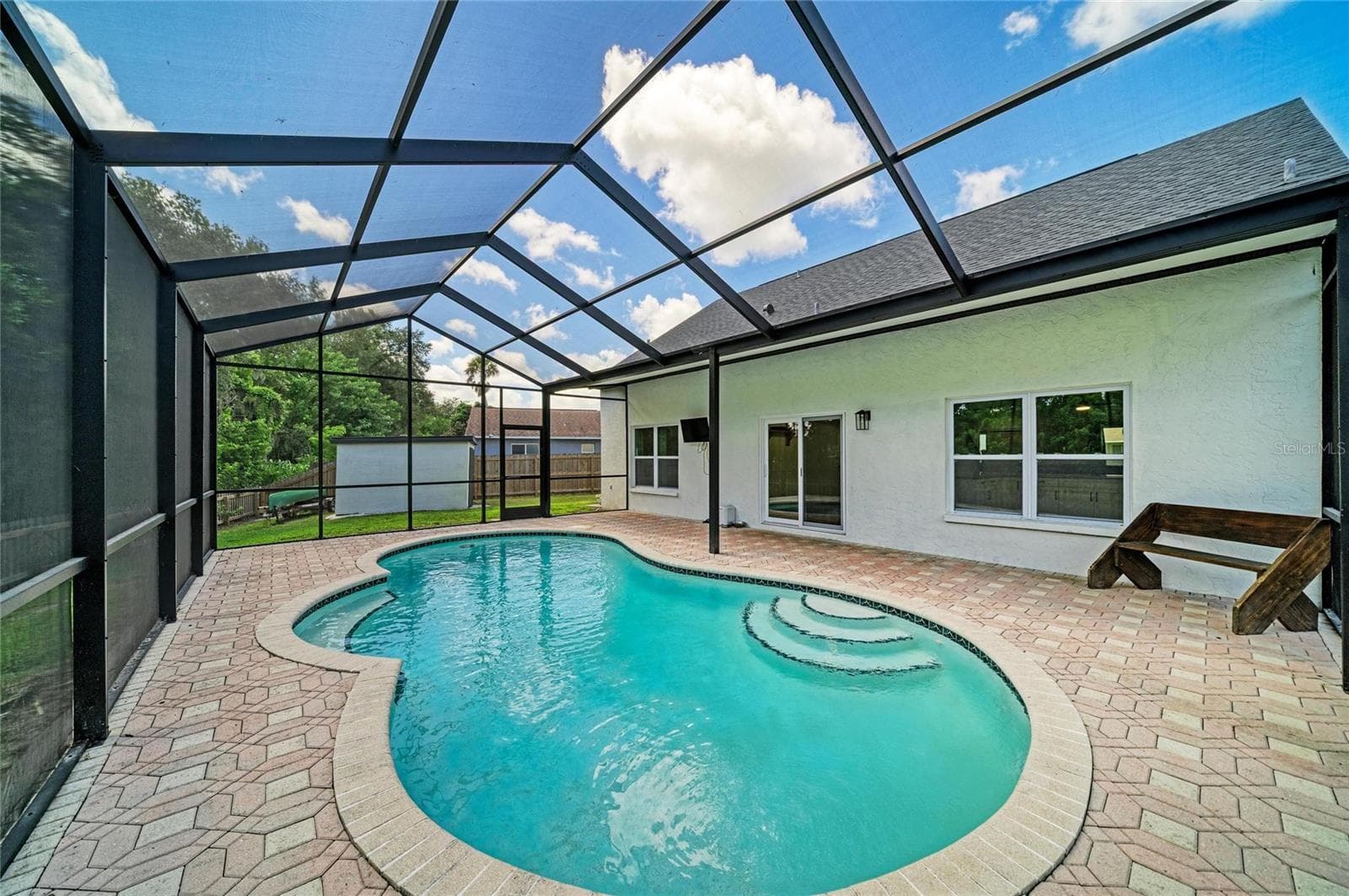 Heated and chilled salt-water pool with newly screened enclosure. - 3220 37TH TER E, BRADENTON