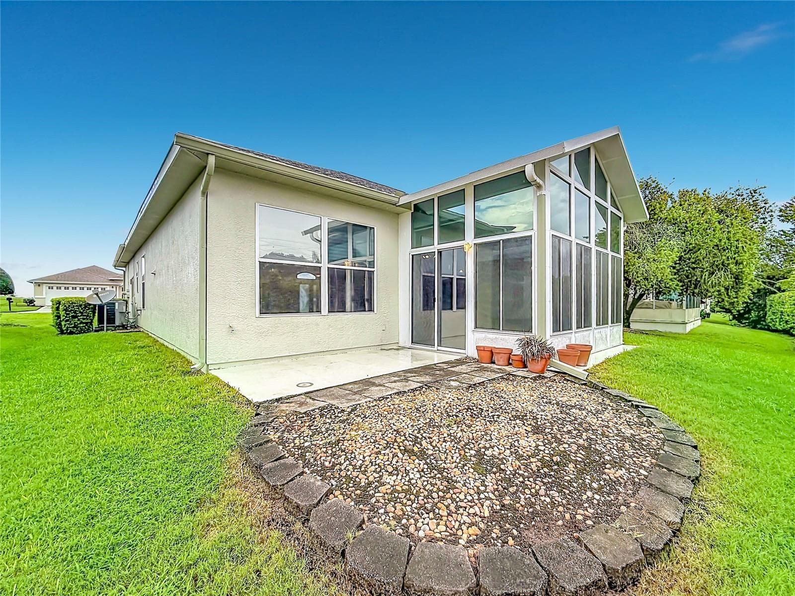 Back side yard with patio - 11932 SE 179TH ST, SUMMERFIELD