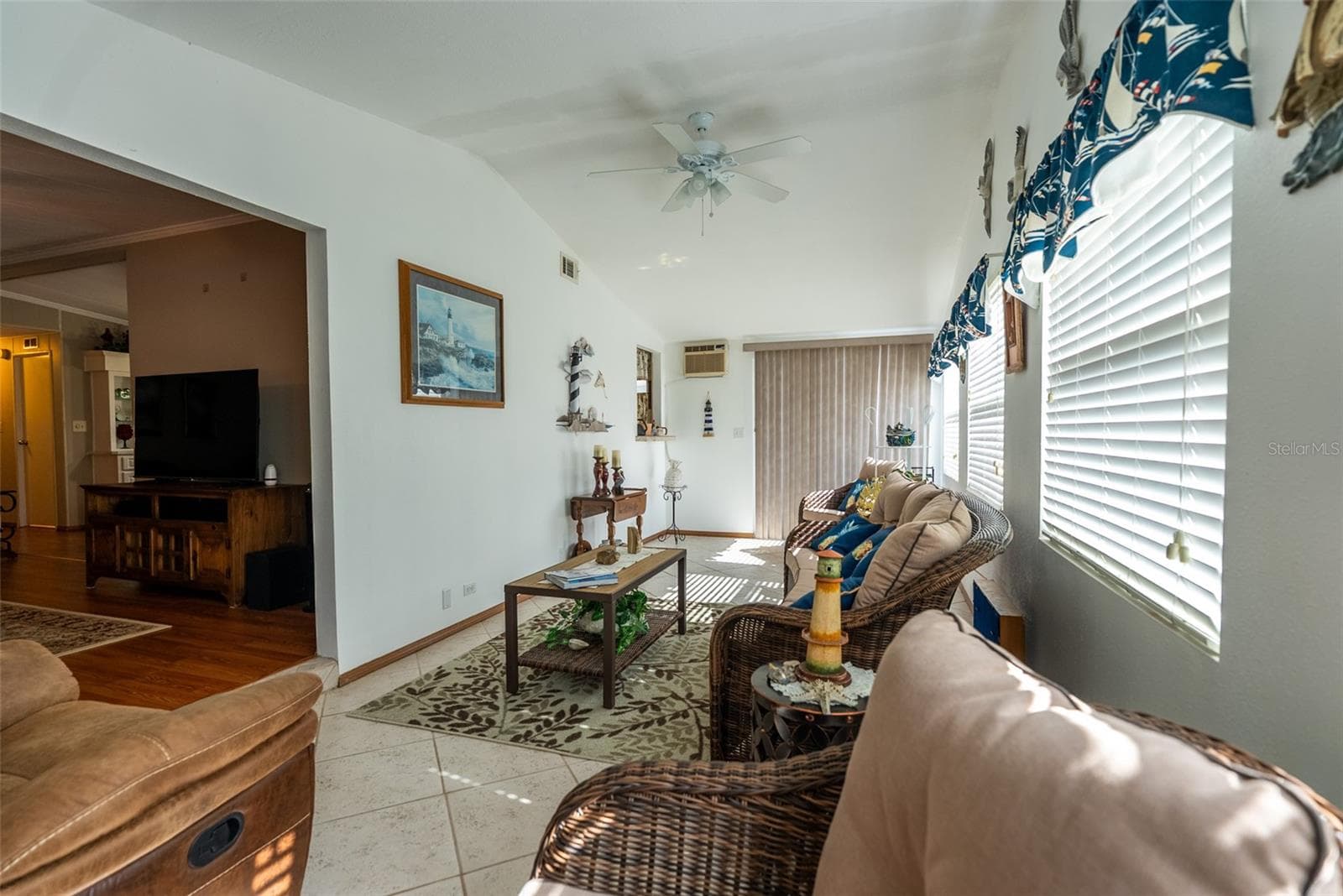 MAIN LIVING ROOM- FURNITURE INCLUDED - 6703 CANTERBURY DR NE, WINTER HAVEN