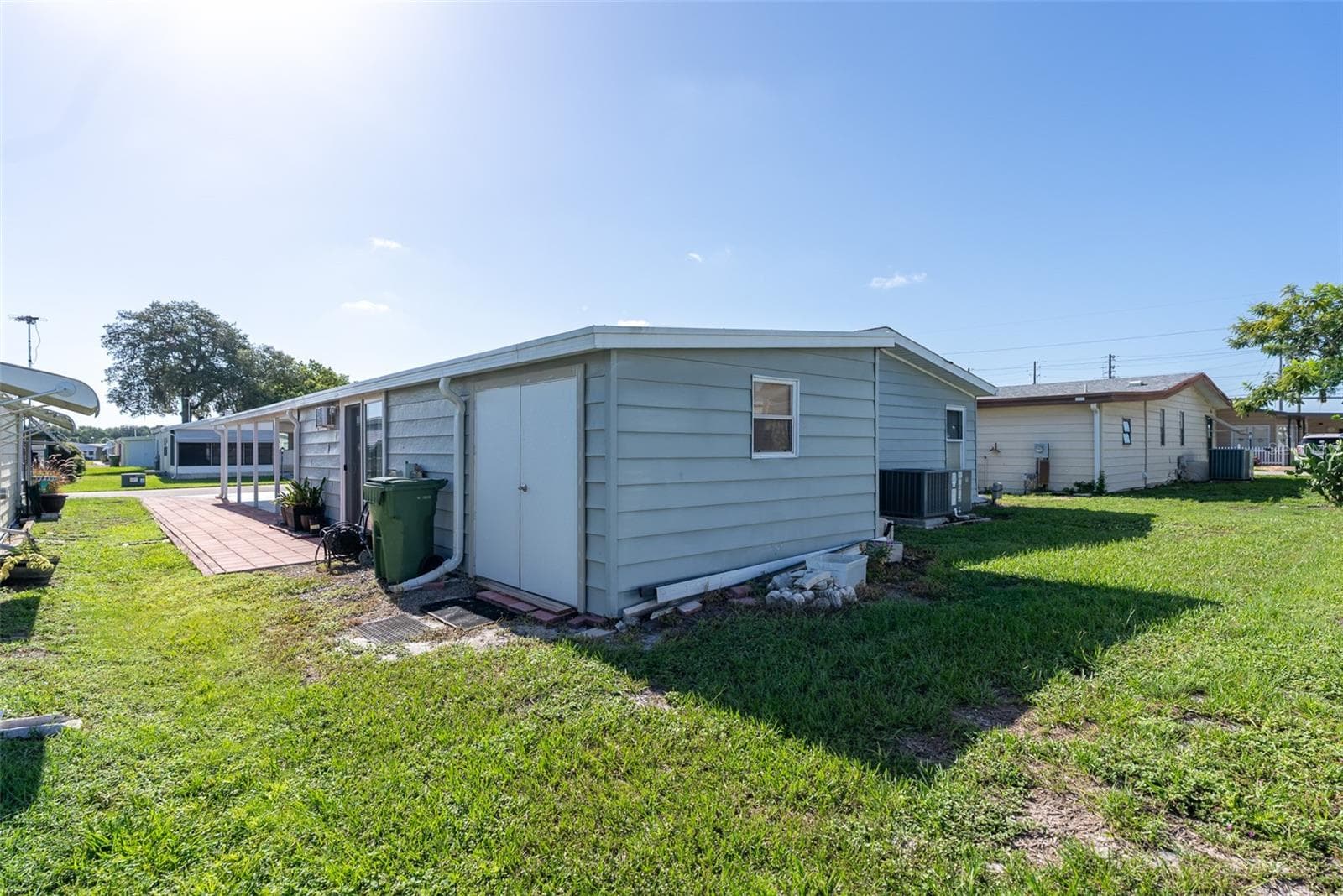 REAR OF HOME - 6703 CANTERBURY DR NE, WINTER HAVEN