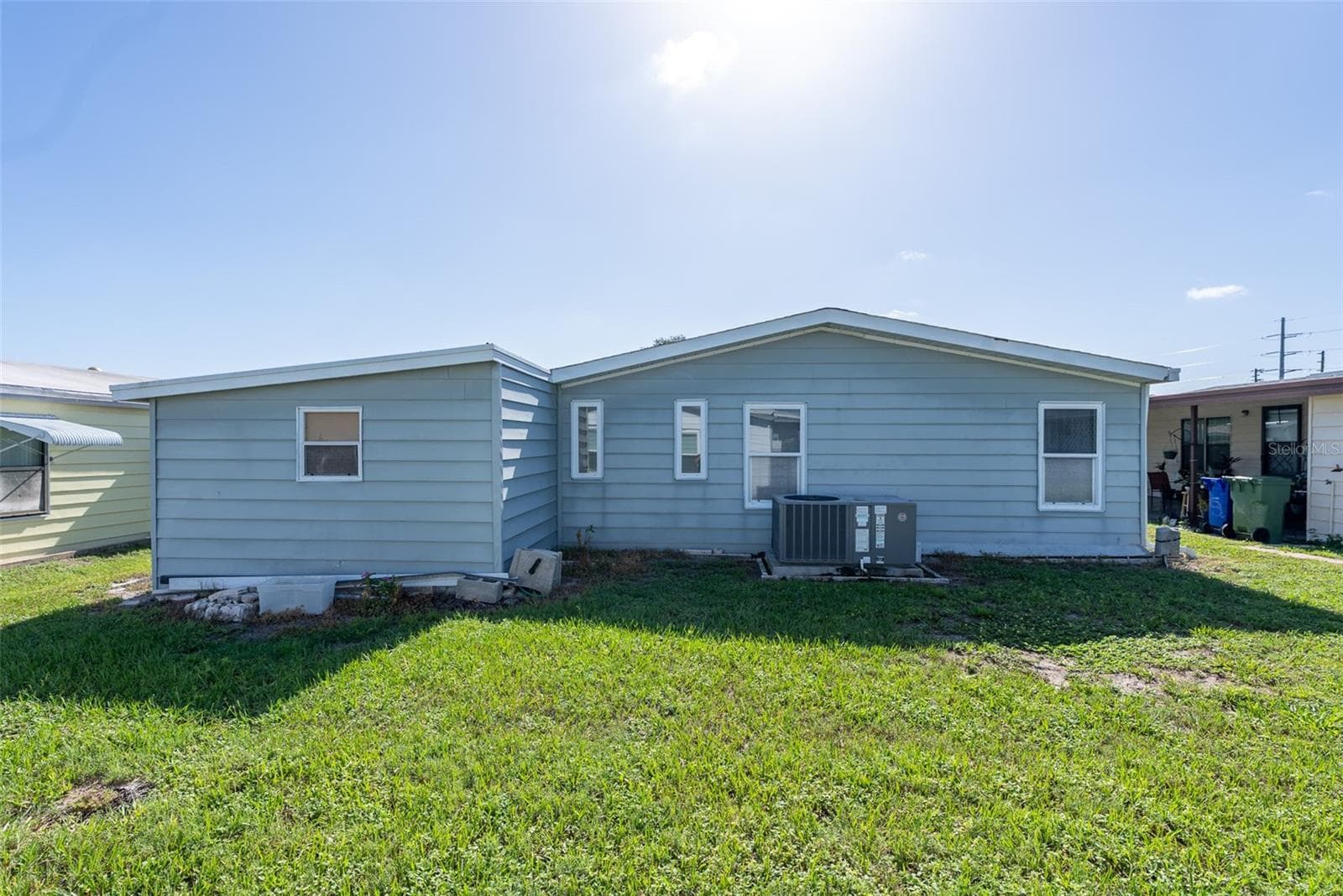 REAR OF HOME - 6703 CANTERBURY DR NE, WINTER HAVEN