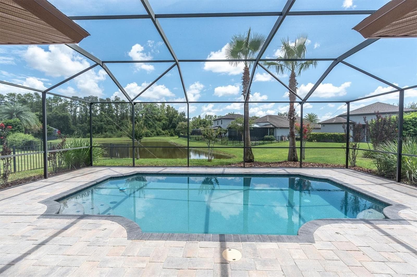 Heated Pool with Pond view - 8454 MAY PORT CT, LAND O LAKES