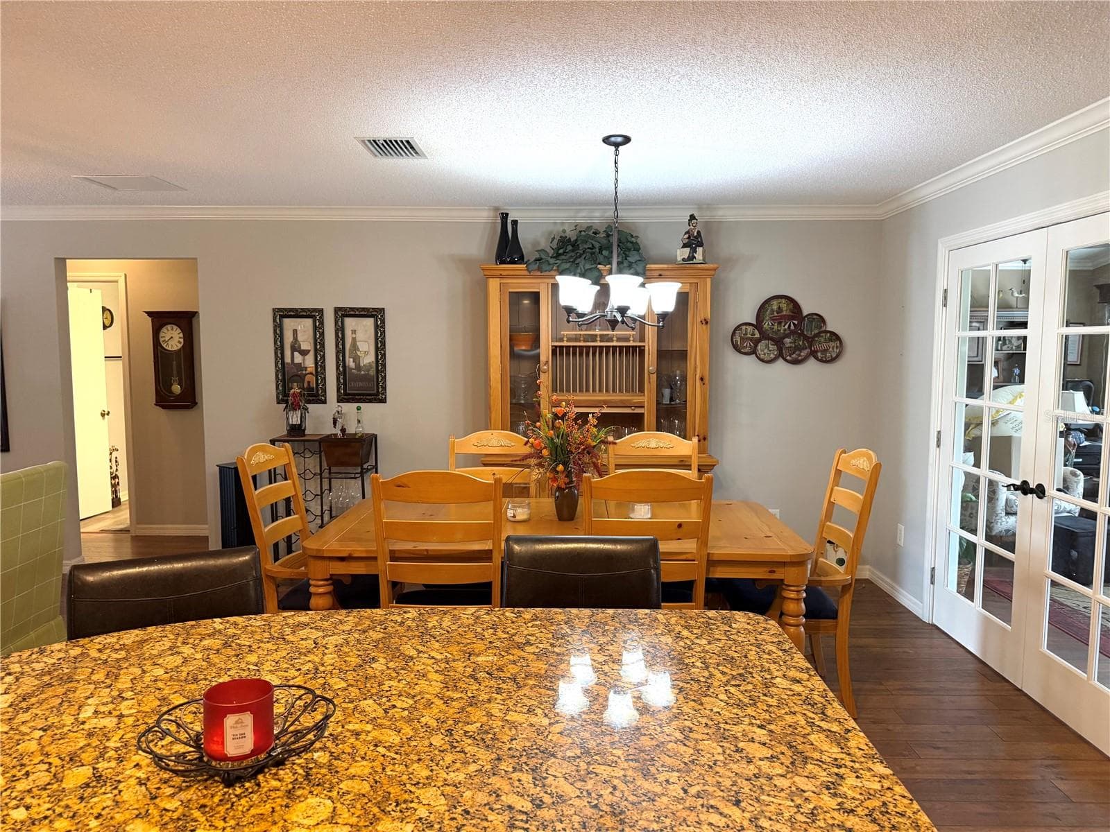 Dinning Room looking across the Kitchen Island - 2417 TATUM TER, THE VILLAGES