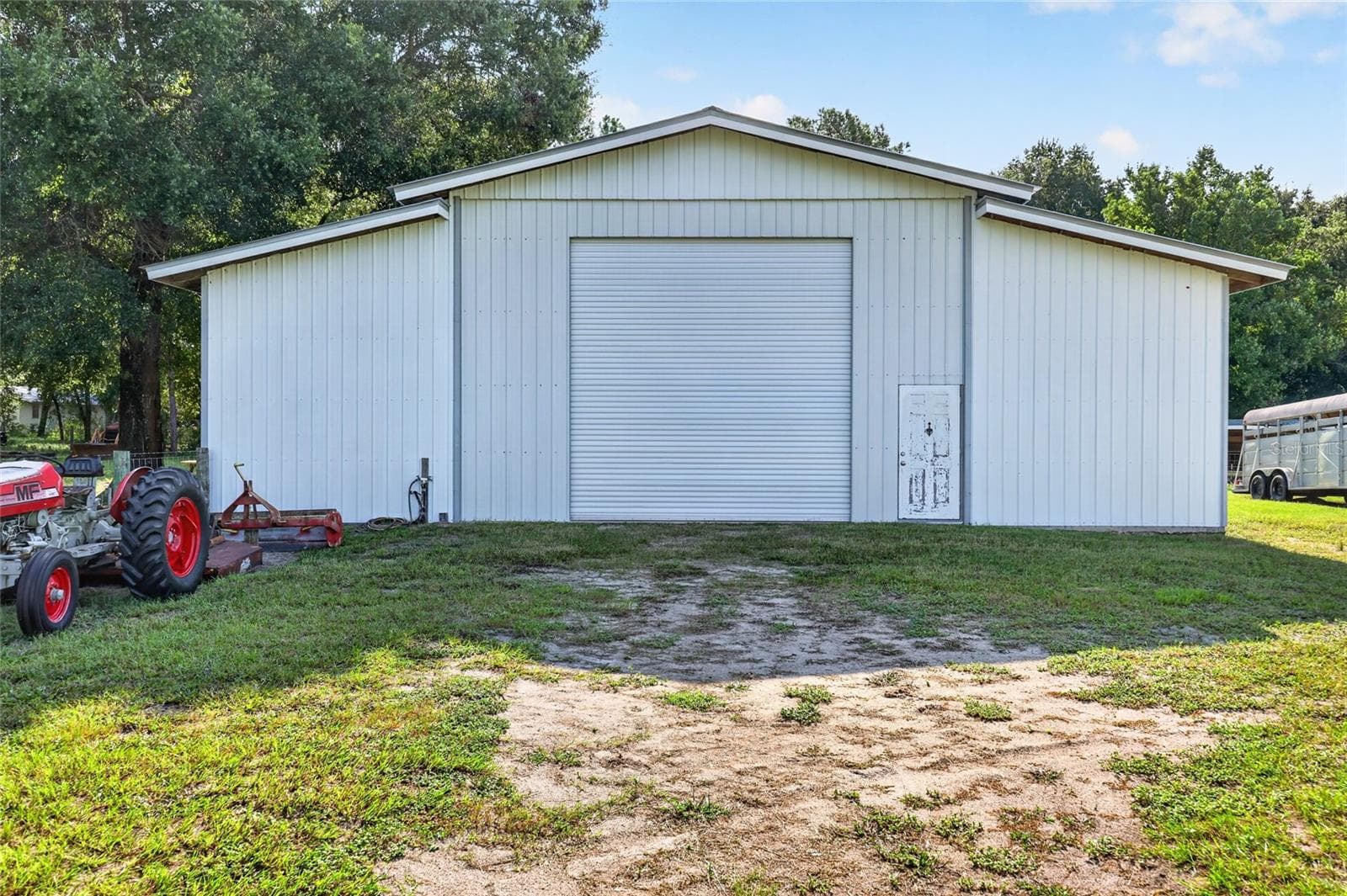 50 x 50 equipment barn with electricity - 20500 NW 27TH ST, MORRISTON