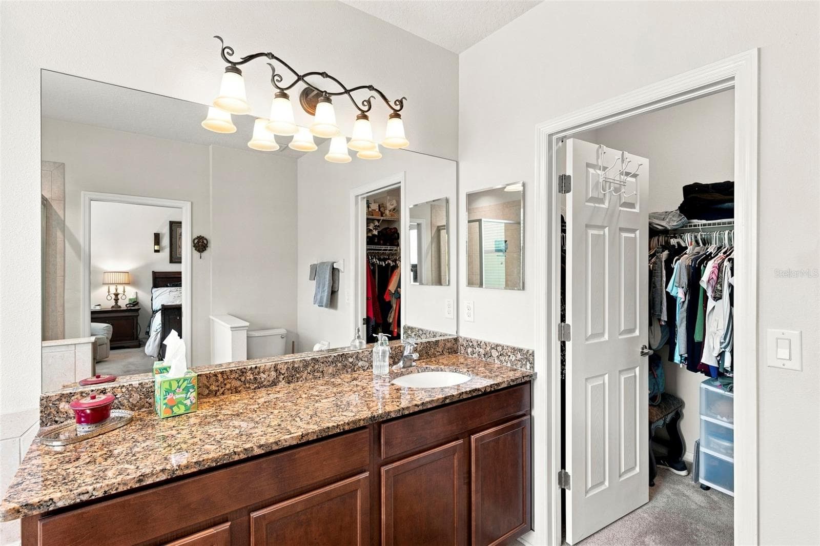 Primary Bath/Entry to Walk-In Closet - 11245 BELLE HAVEN DR, NEW PORT RICHEY