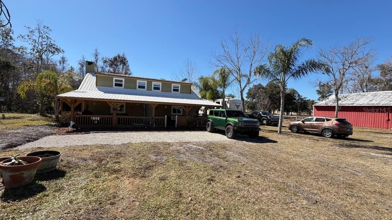 Single Family Residence at 445 S STATE ROAD 415, OSTEEN, photo 3 of 29