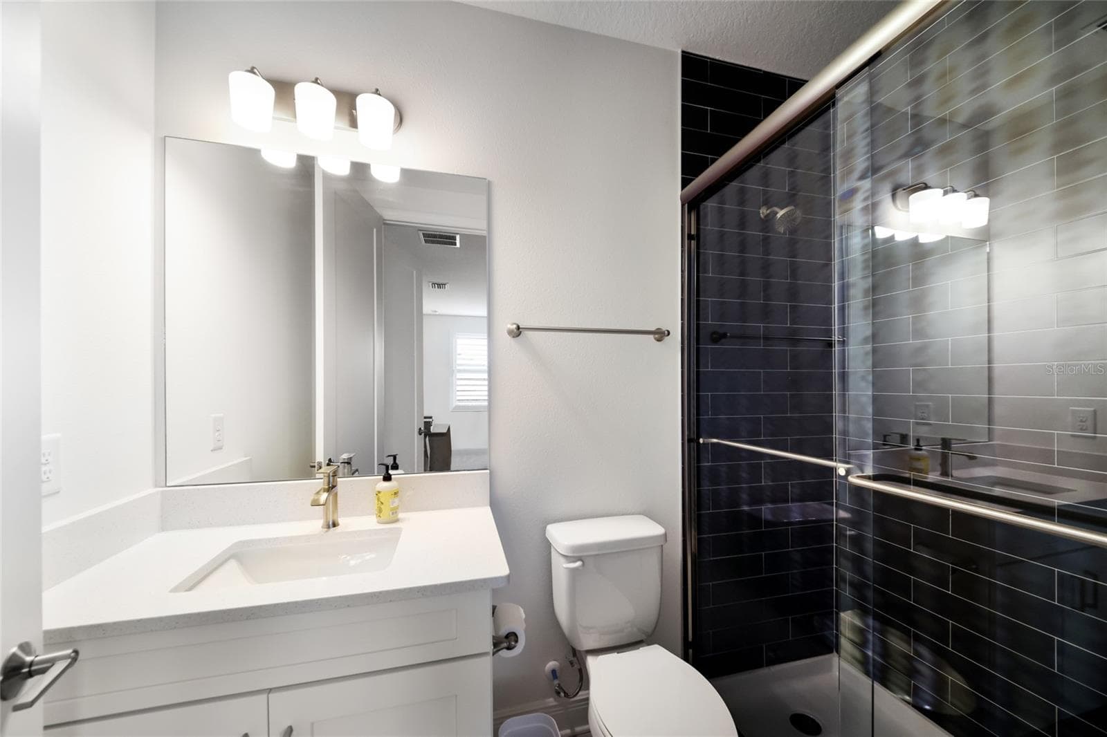 2nd Floor En-Suite for Bedroom 2 - 4811 HONEY DEW LN, BRADENTON