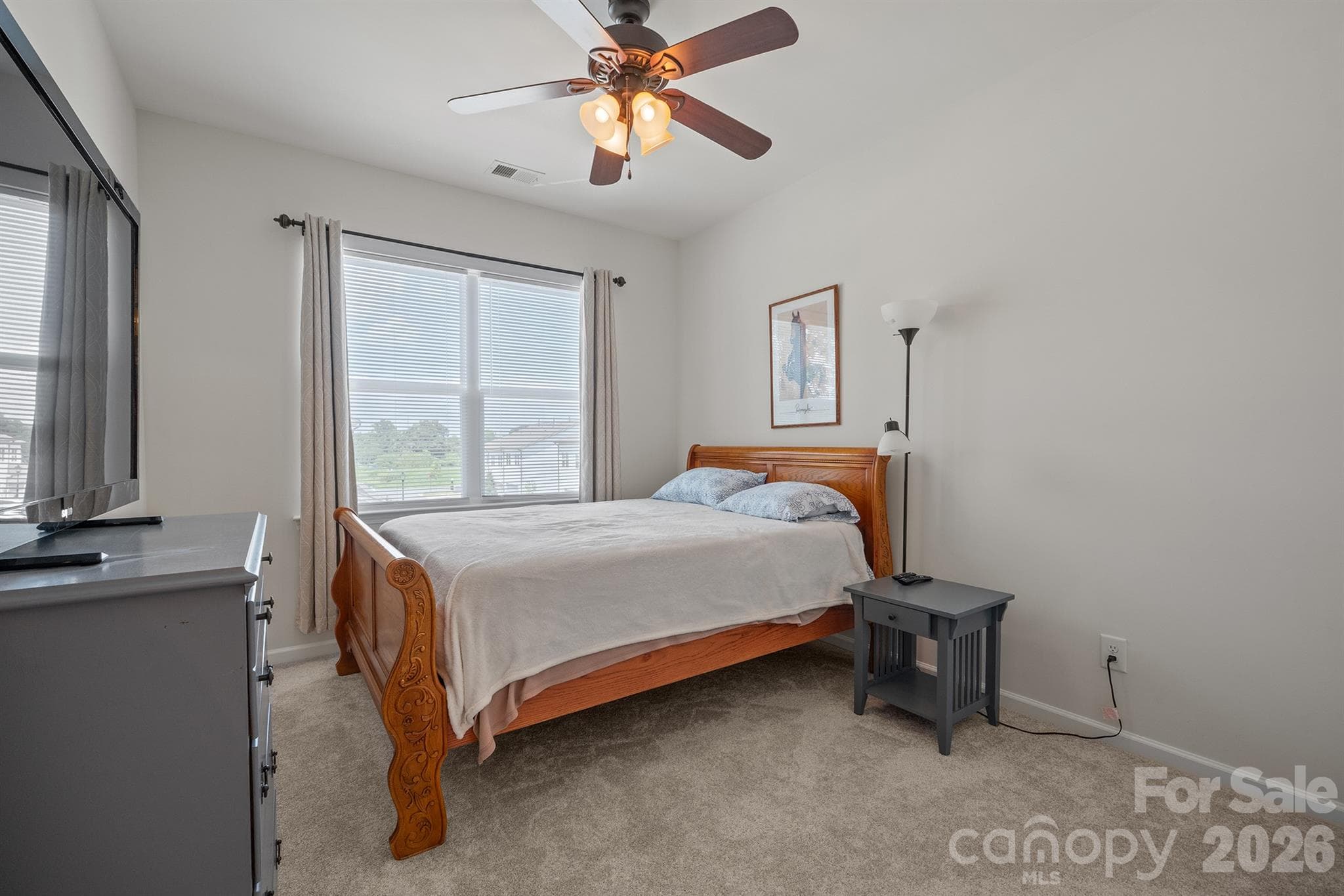 Bedroom 2 with ceiling fan and walk in closet - 6161 Pierce Lane, Kannapolis