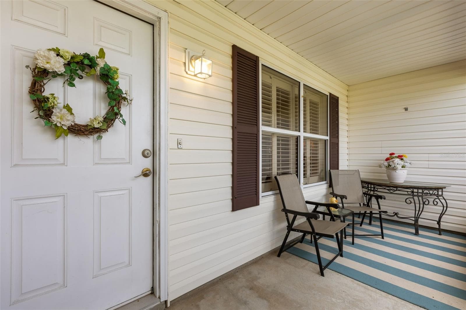 Screened Front Porch - 2527 BOTELLO AVE, THE VILLAGES