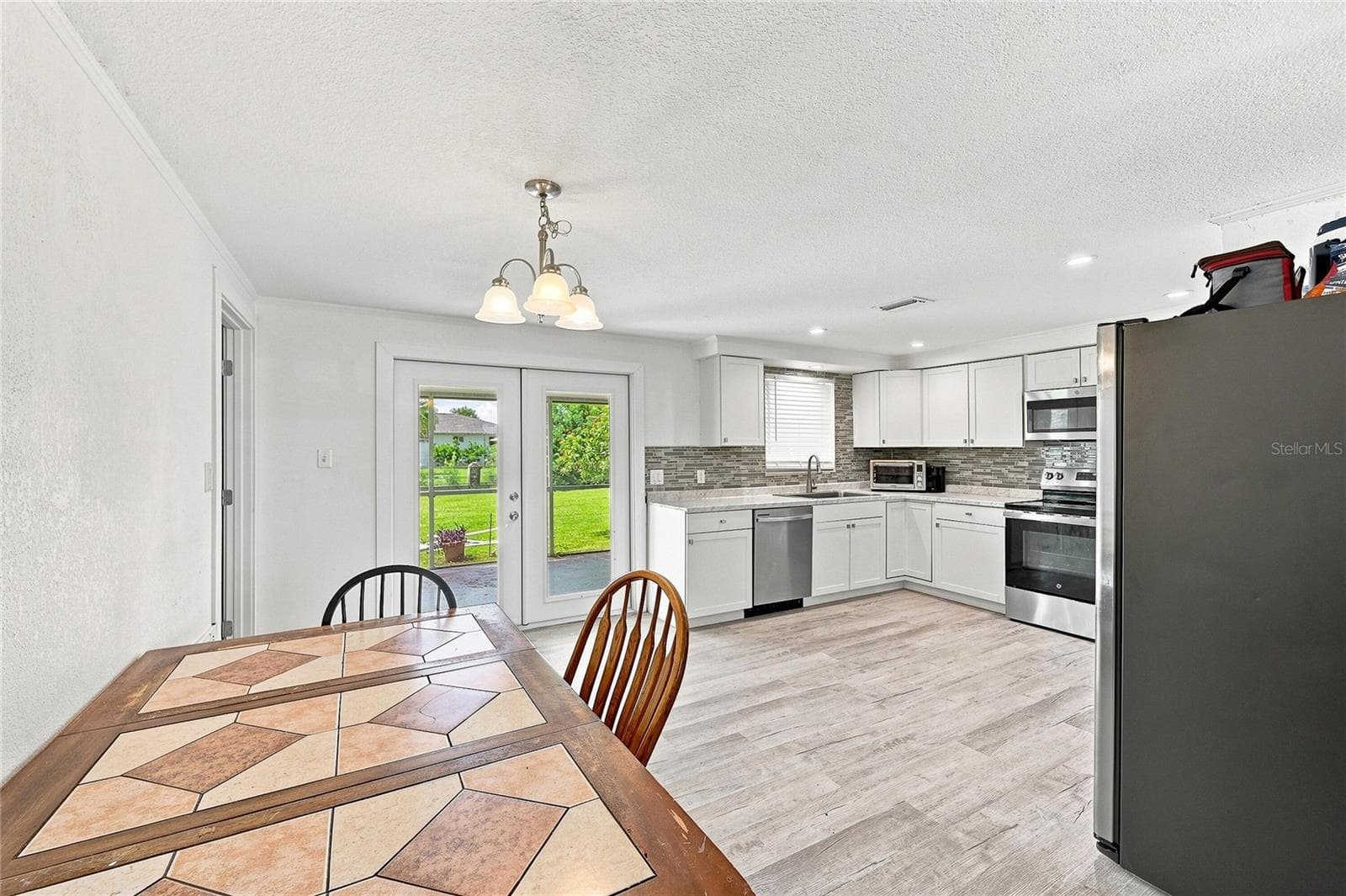 Single Family Residence at 457 GARFIELD AVE NW, PORT CHARLOTTE, photo 8 of 27