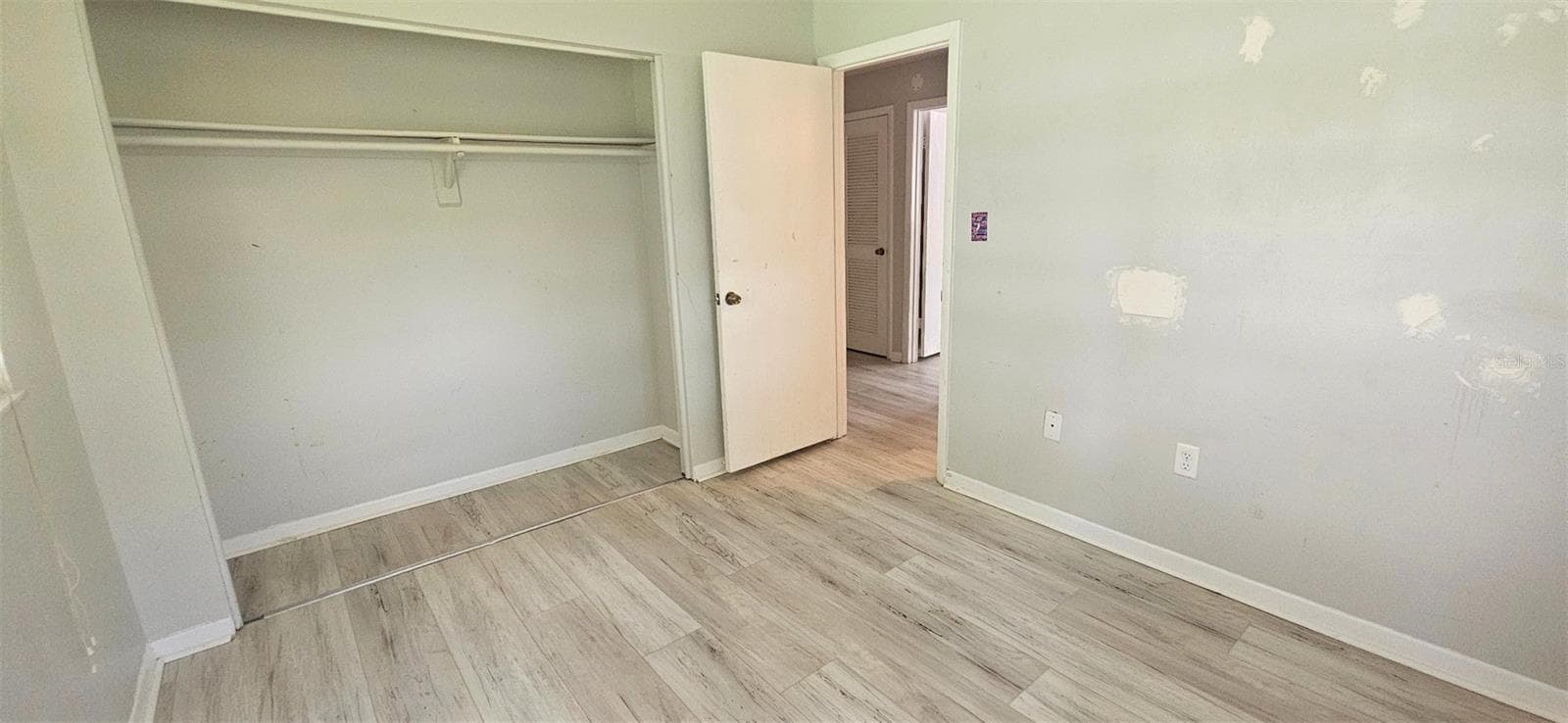 Rear bedroom with built in closet - 2405 SE 16TH AVE #B, OCALA