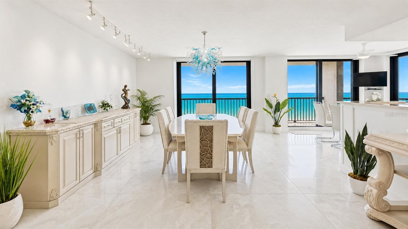 Plenty of places to sit surrounded by sun and sand. - 1660 GULF BLVD #PH1, CLEARWATER BEACH