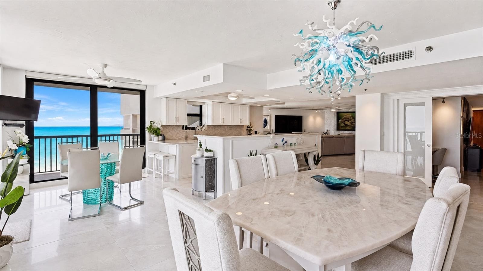 Rare Crystallo Quartzite tabletop provides an exotic touch to the dining area. - 1660 GULF BLVD #PH1, CLEARWATER BEACH