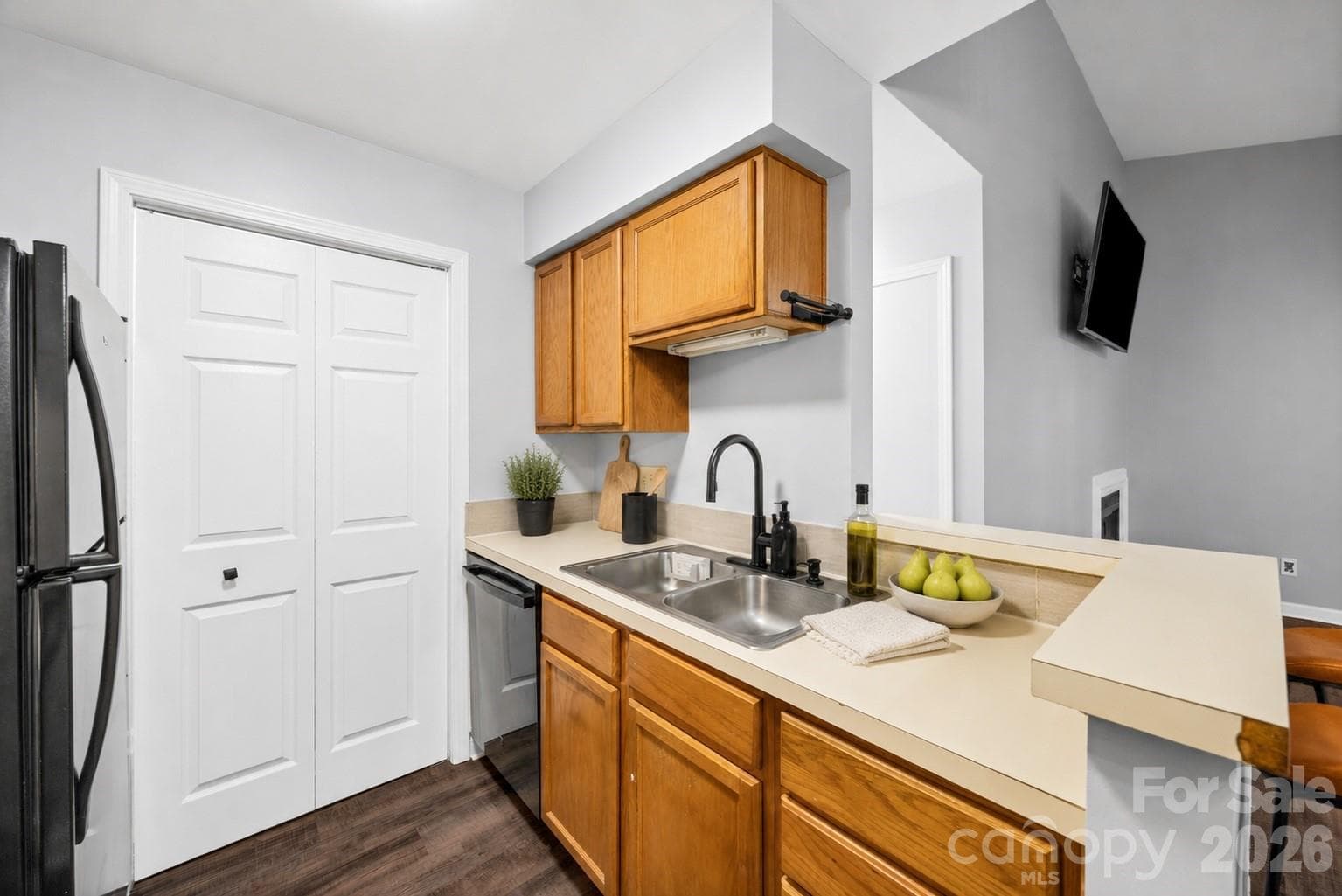 Kitchen with Laundry behind the door. - 8119 Tremaine Court, Charlotte