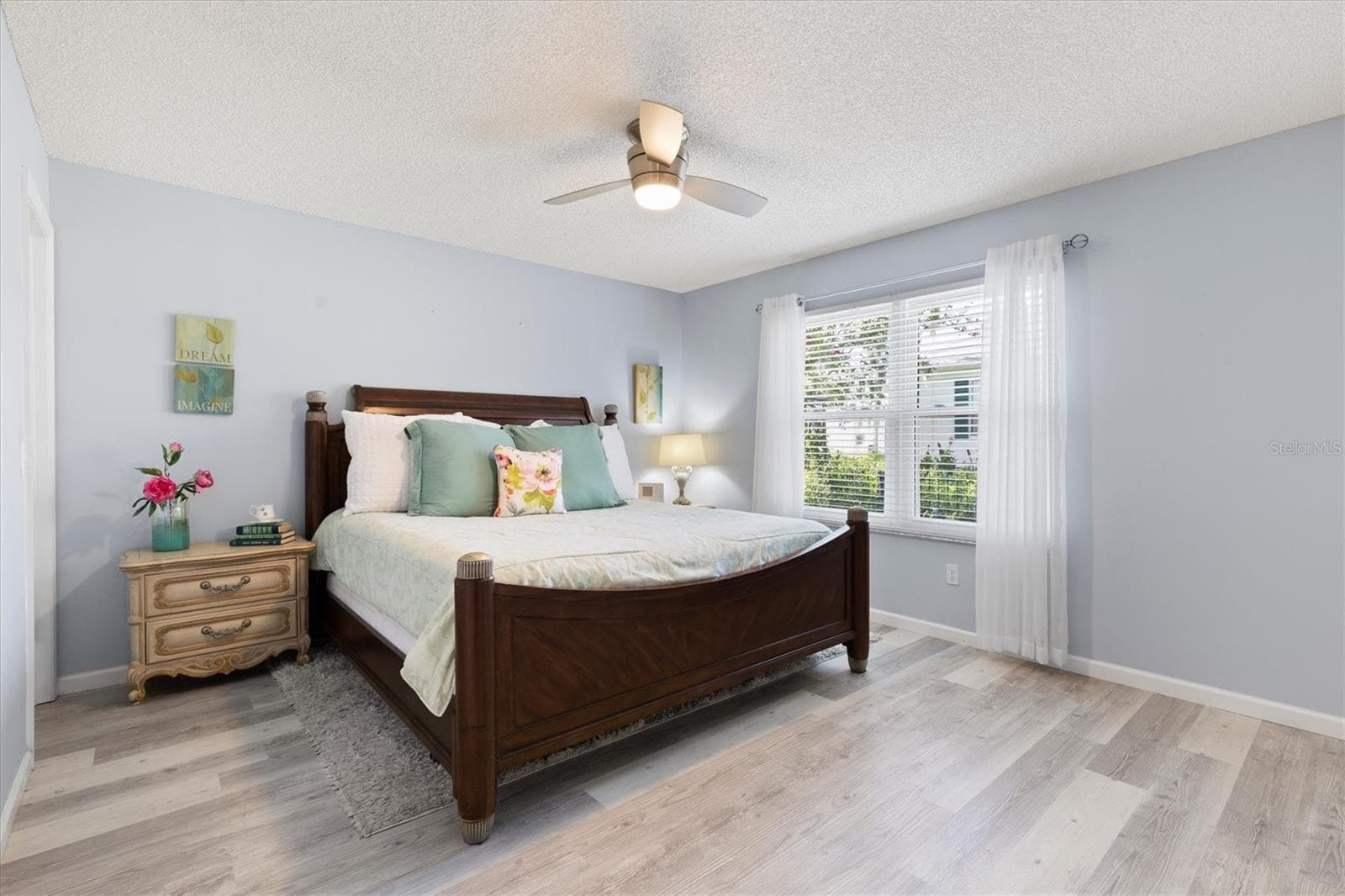 PRIMARY BEDROOM WITH BEAUTIFUL BEDDING - 1426 JUAREZ PL, THE VILLAGES