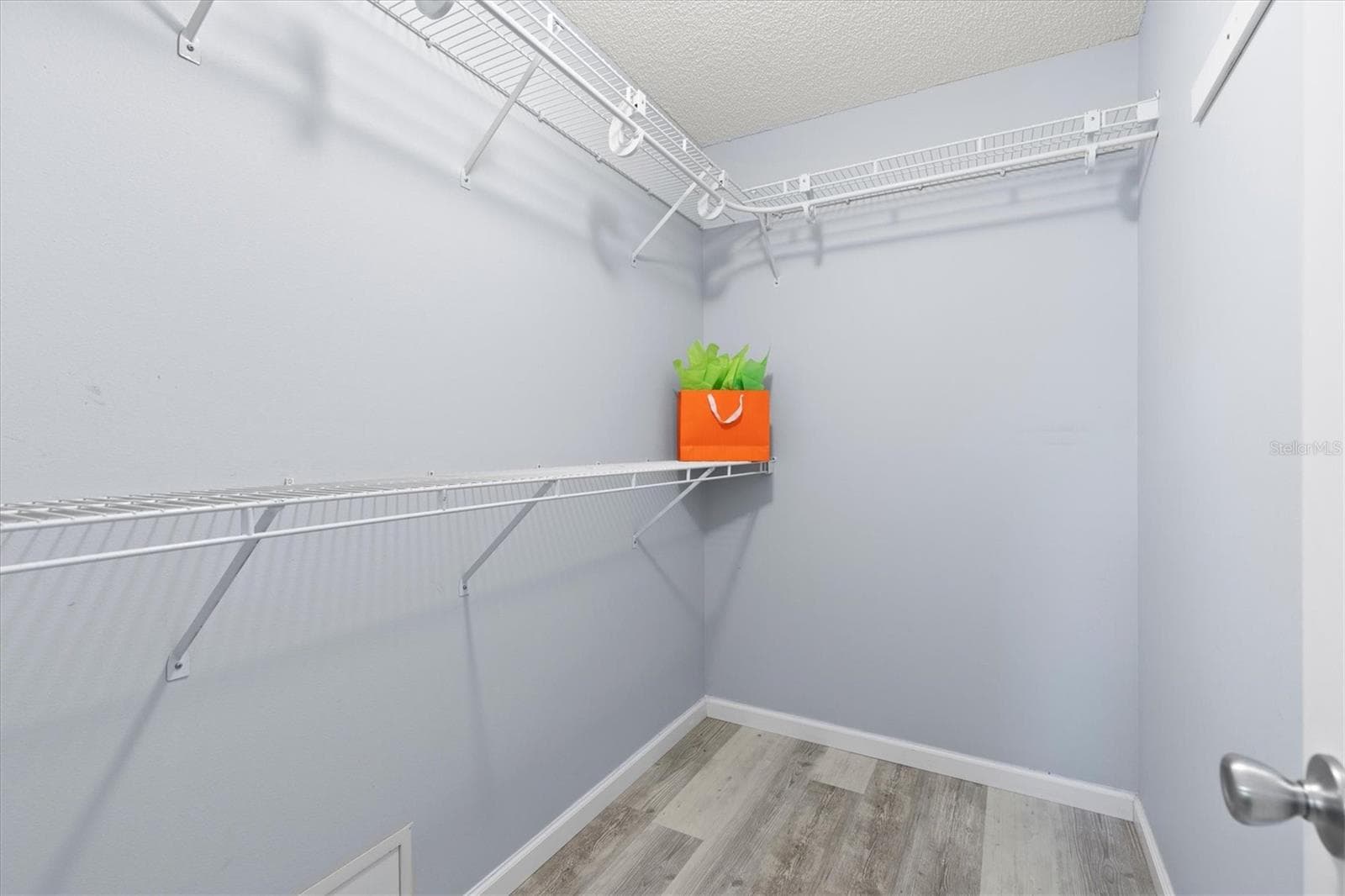 PRIMARY WALK IN CLOSET - 1426 JUAREZ PL, THE VILLAGES