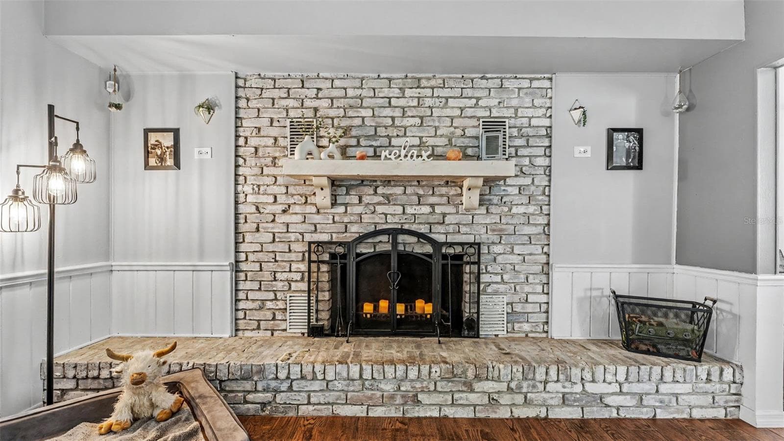 family room fireplace - 2406 LAKE ELLA RD, FRUITLAND PARK