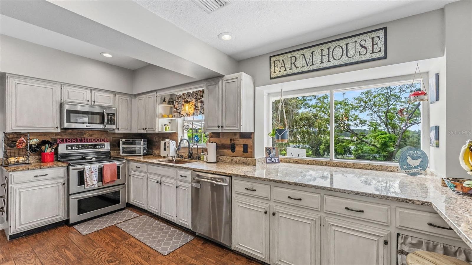 kitchen w/ large window - 2406 LAKE ELLA RD, FRUITLAND PARK