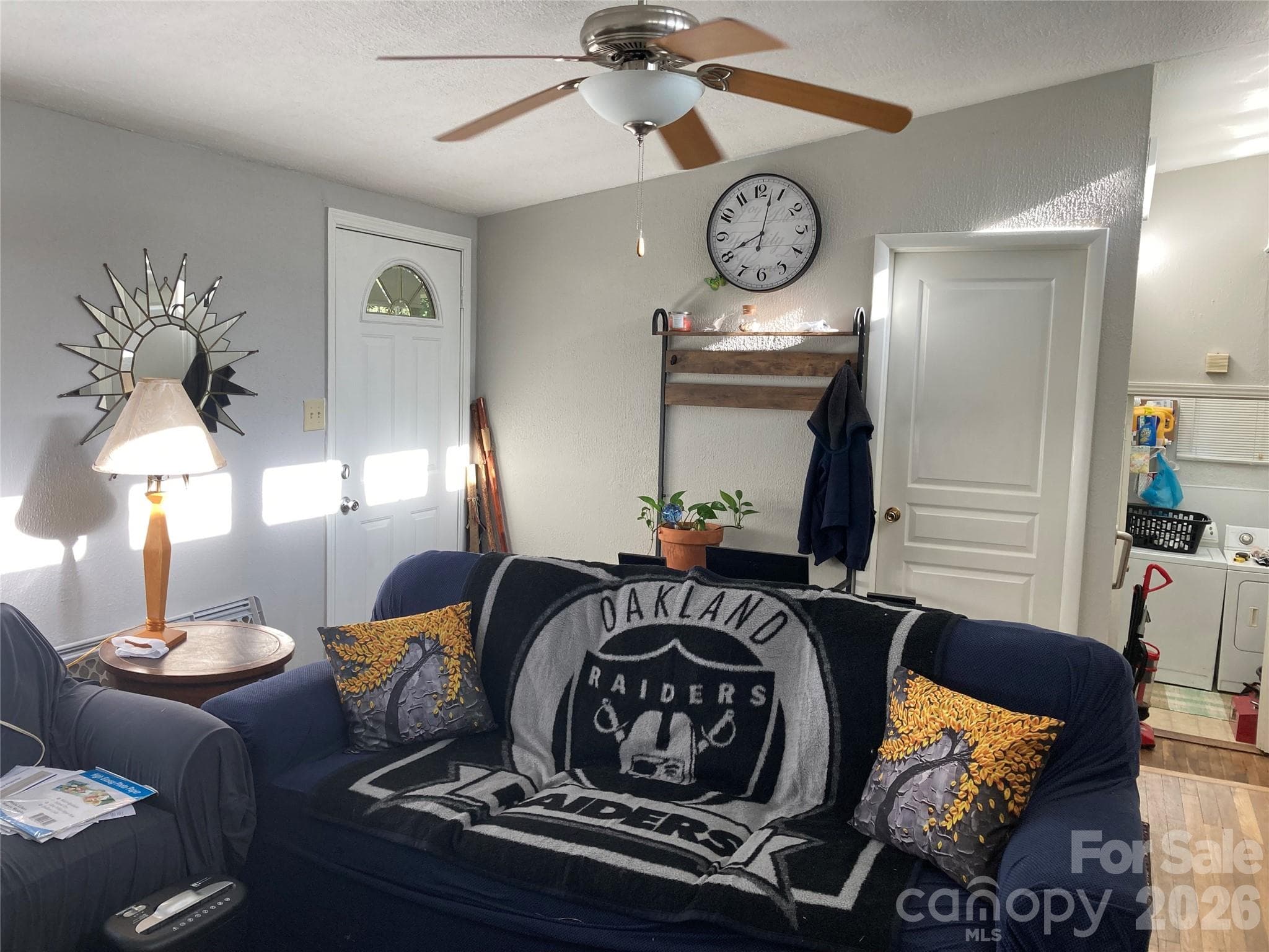 real tenant's furniture in living rm for scale - 216 Auten Circle, Mount Holly