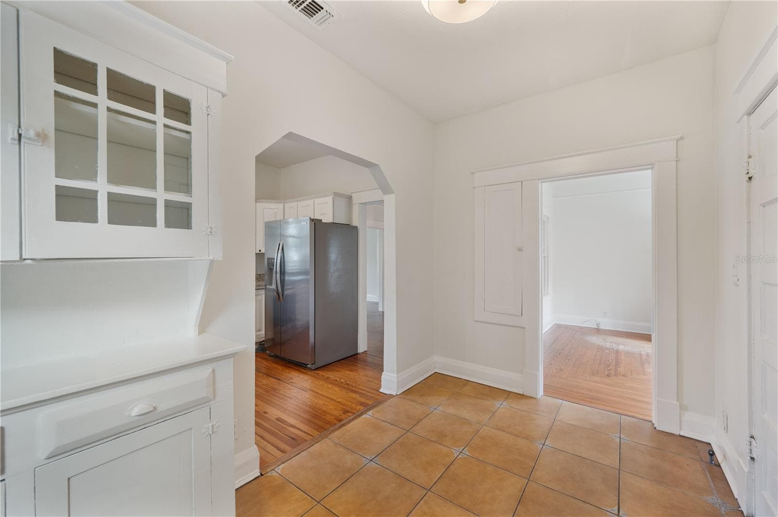 Dinette eating space with original built-in hutch - 816 S INGRAHAM AVE, LAKELAND