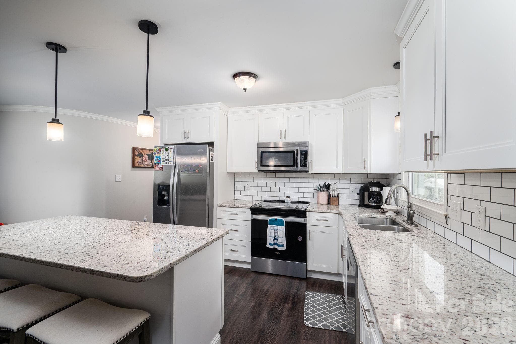 Kitchen with white shaker cabinets - 1718 Woolie Road, Lincolnton
