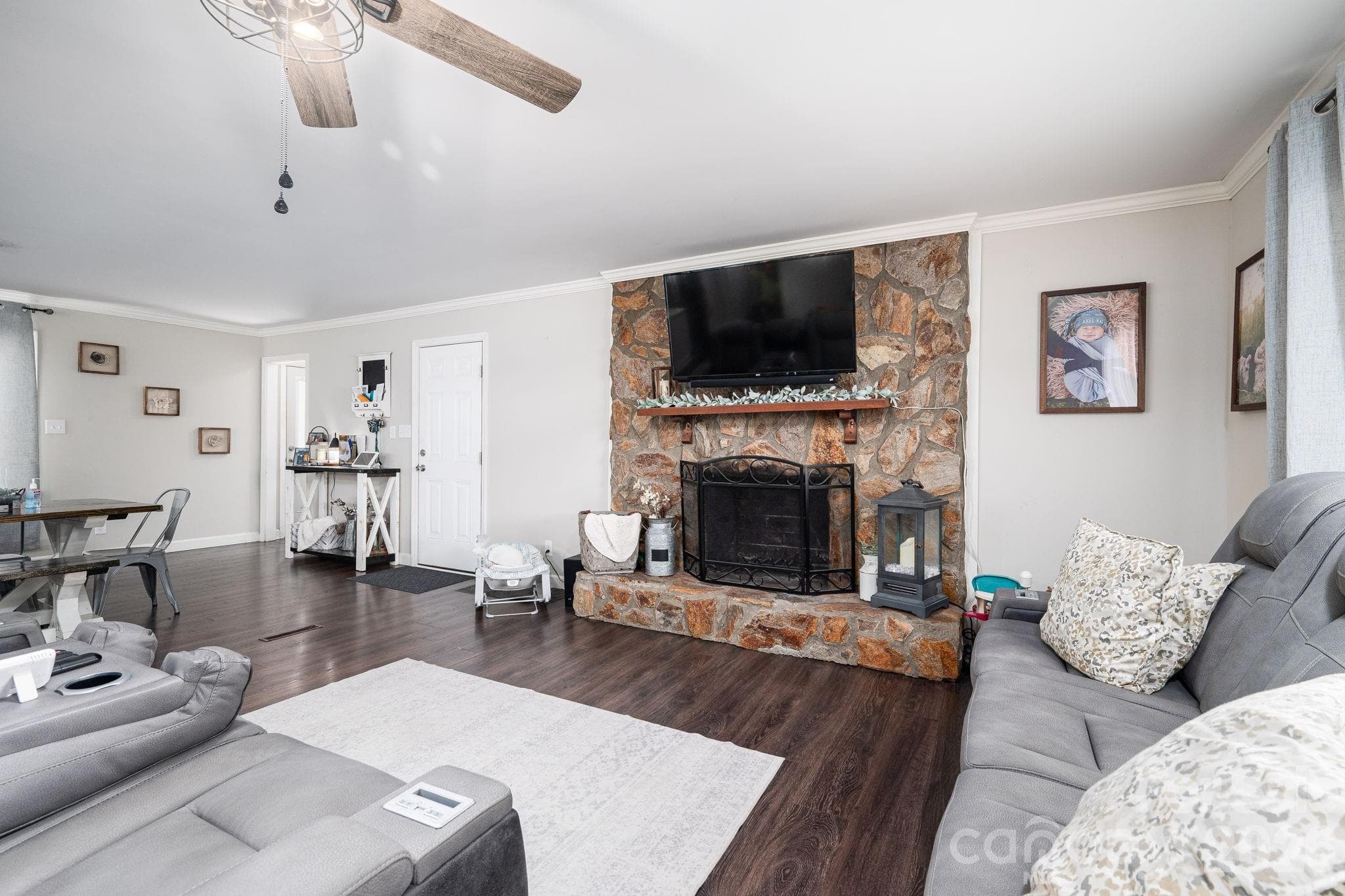Living room with wood burning fireplace - 1718 Woolie Road, Lincolnton