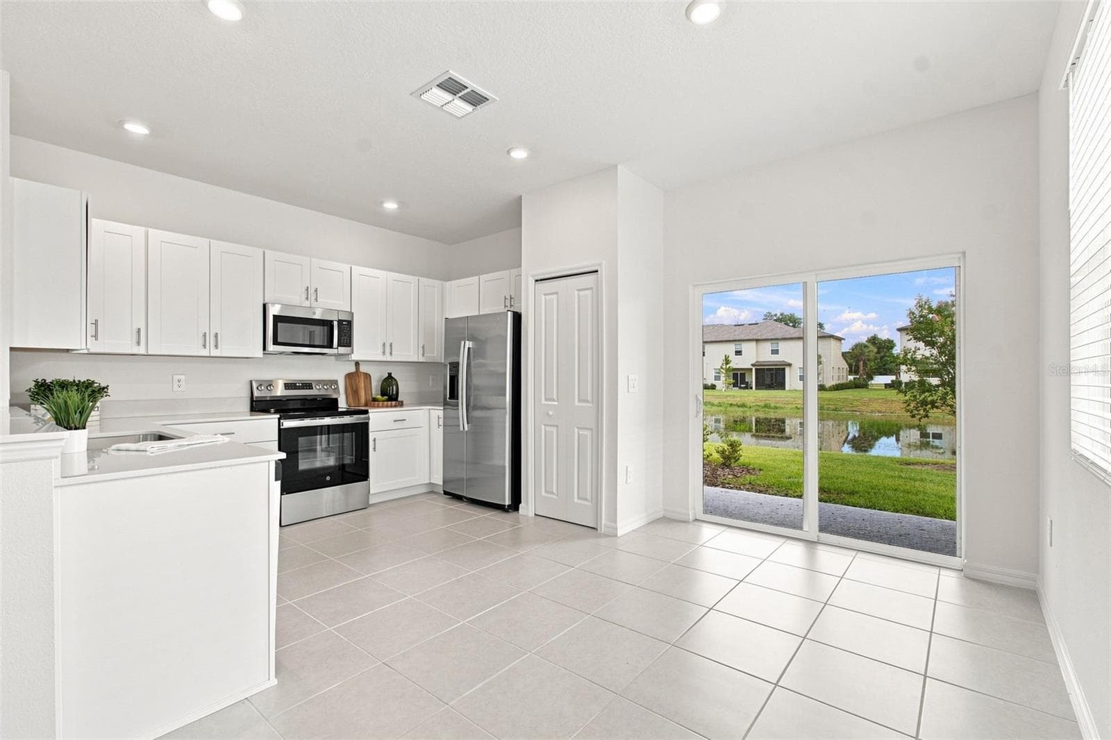 Townhouse at 36159 RISA MICHELE ST, ZEPHYRHILLS, photo 6 of 34
