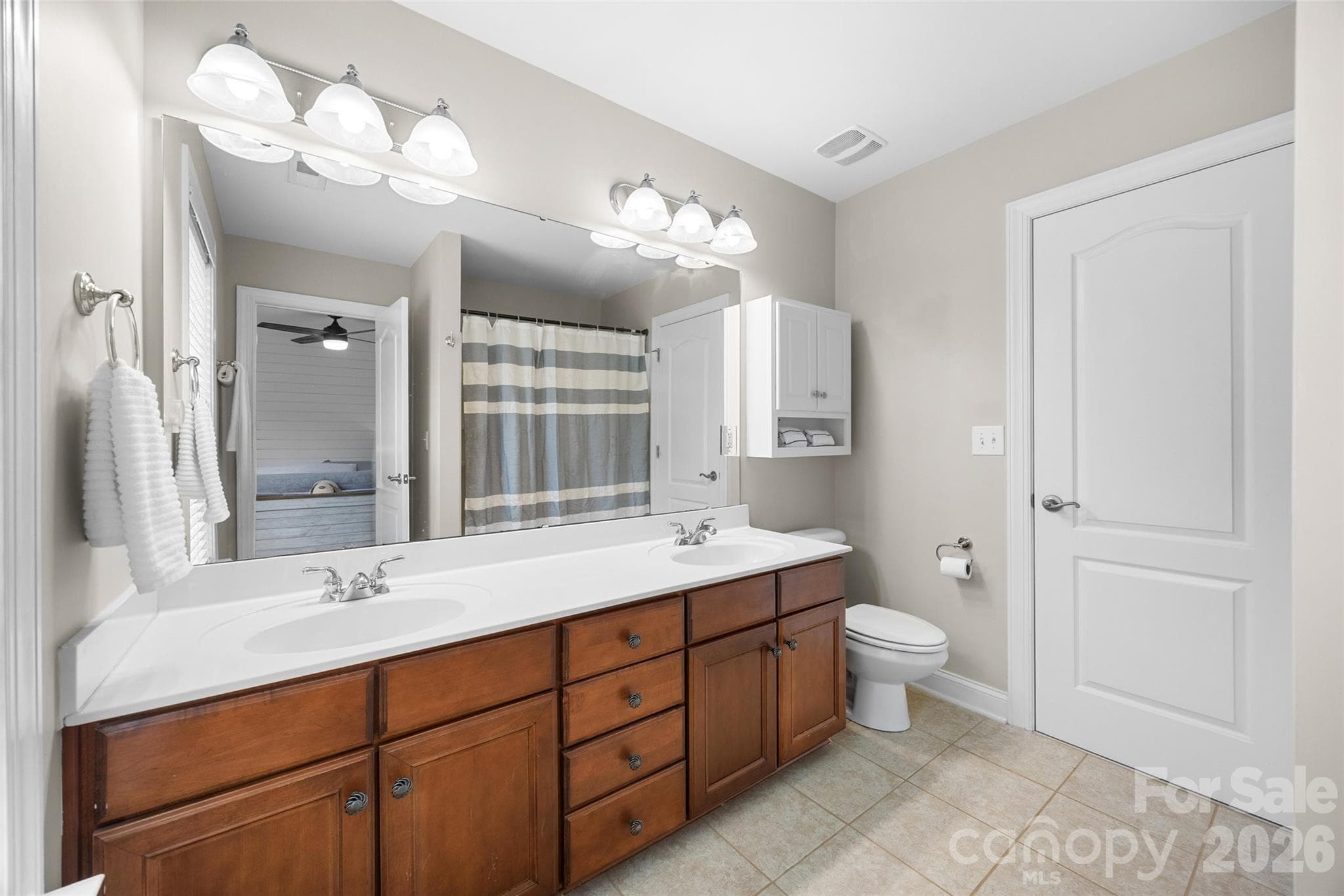 Upper level Jack and Jill bathroom between bedrooms 4 and 5 - 2209 Trading Ford Drive, Waxhaw